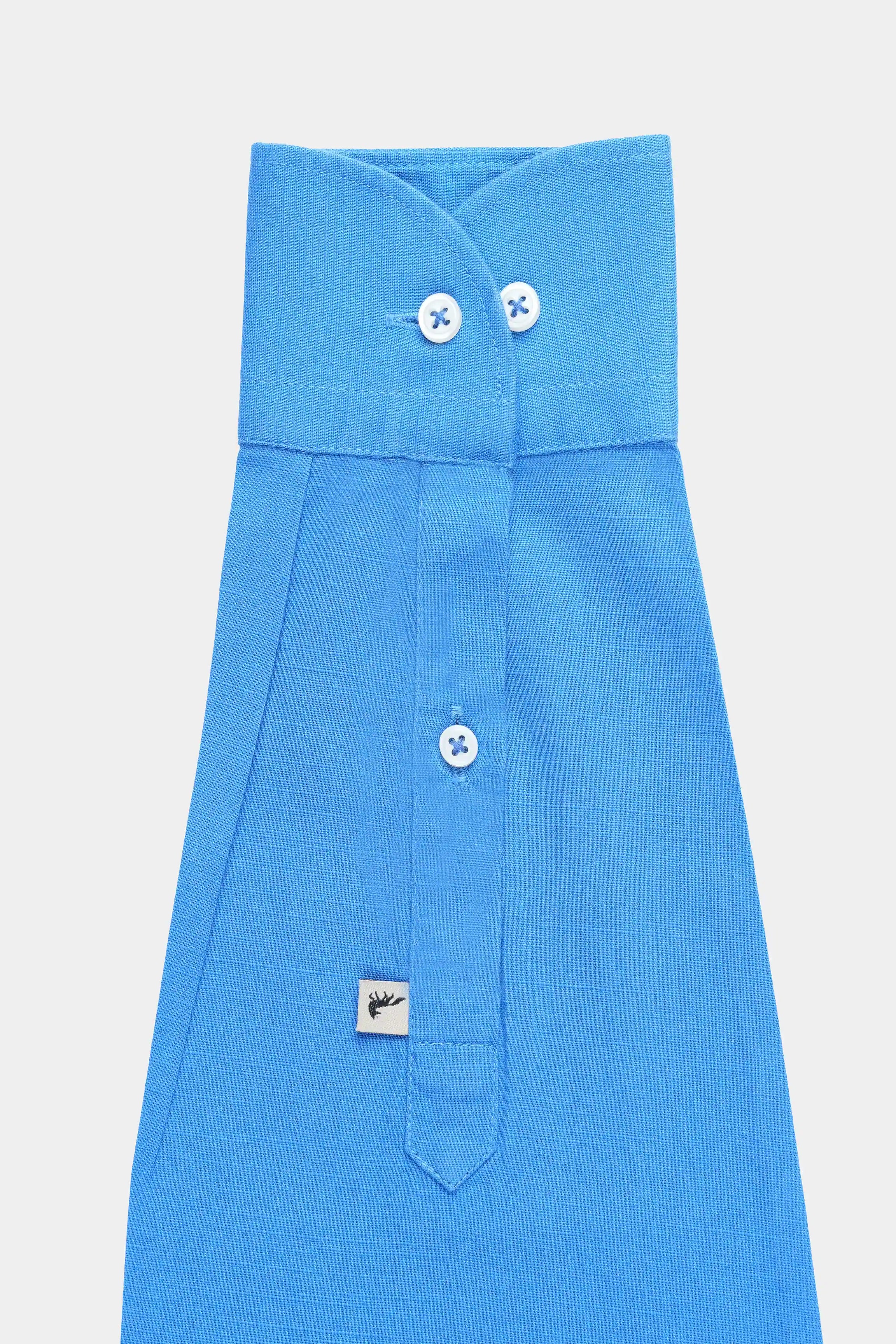 Blue linen shirt with wide spread collar, button placket, and chest pocket