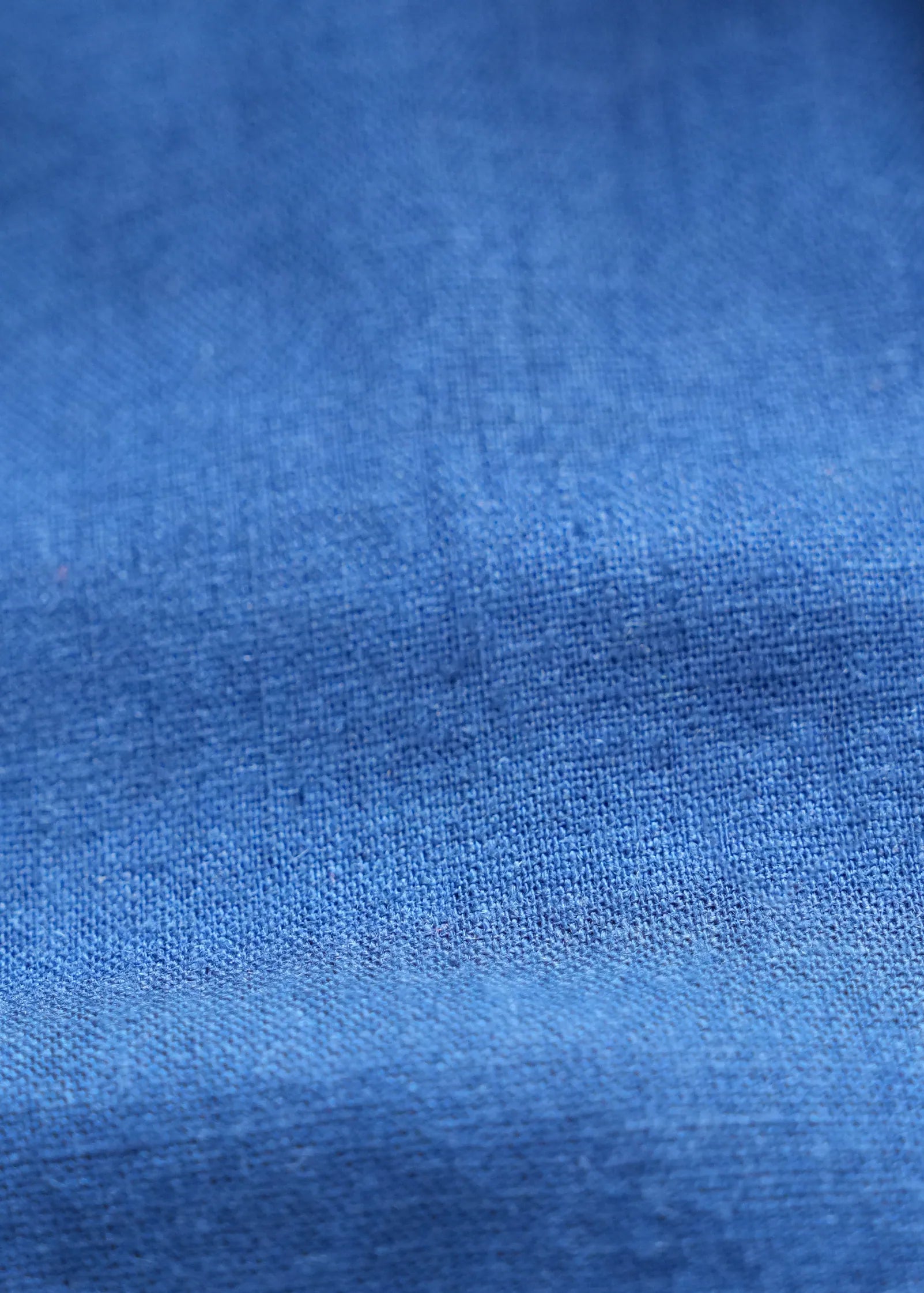 Navy linen fabric texture close-up, breathable woven look
