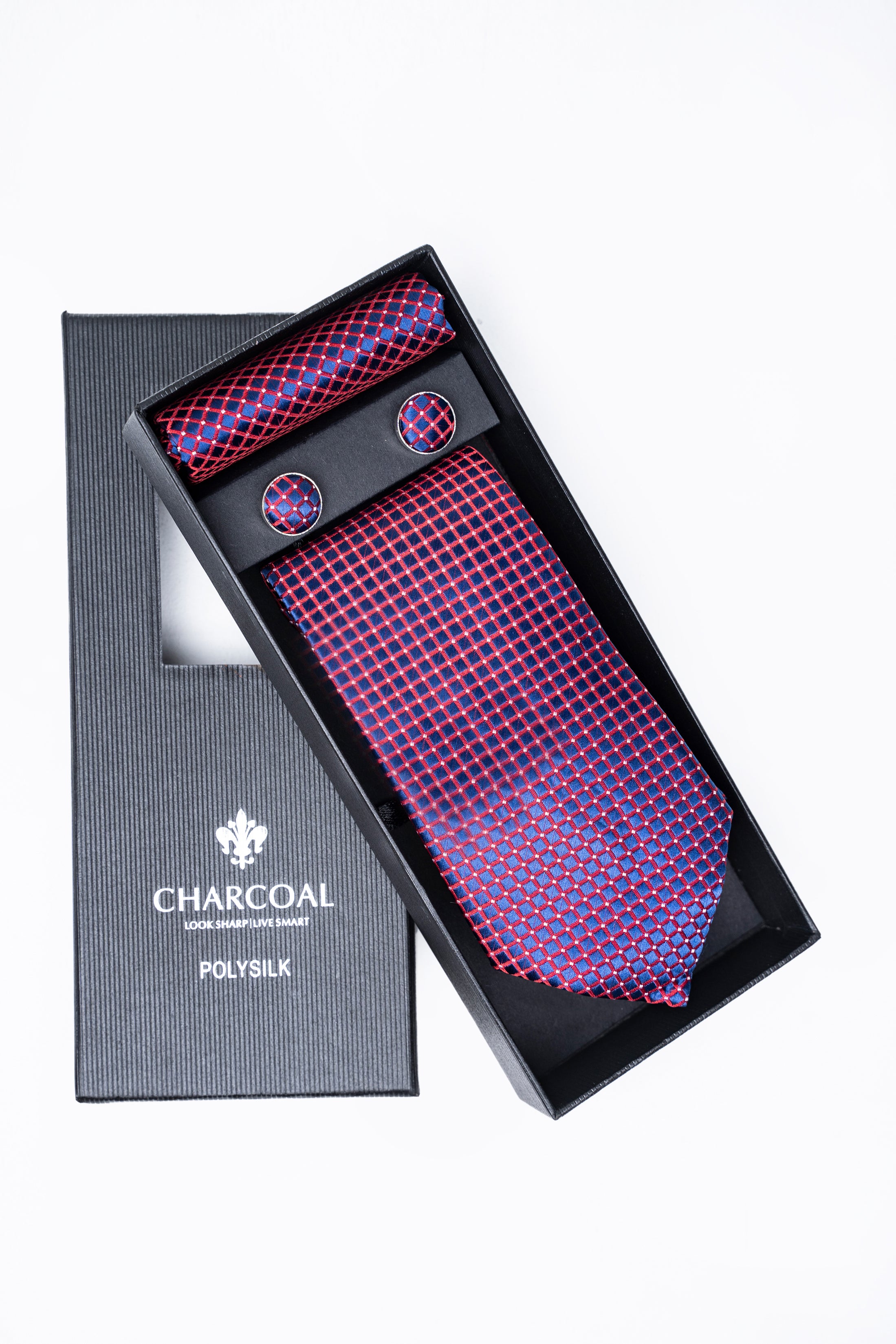 Box tie set in gift box with purple grid necktie, folded pocket square, and cufflinks