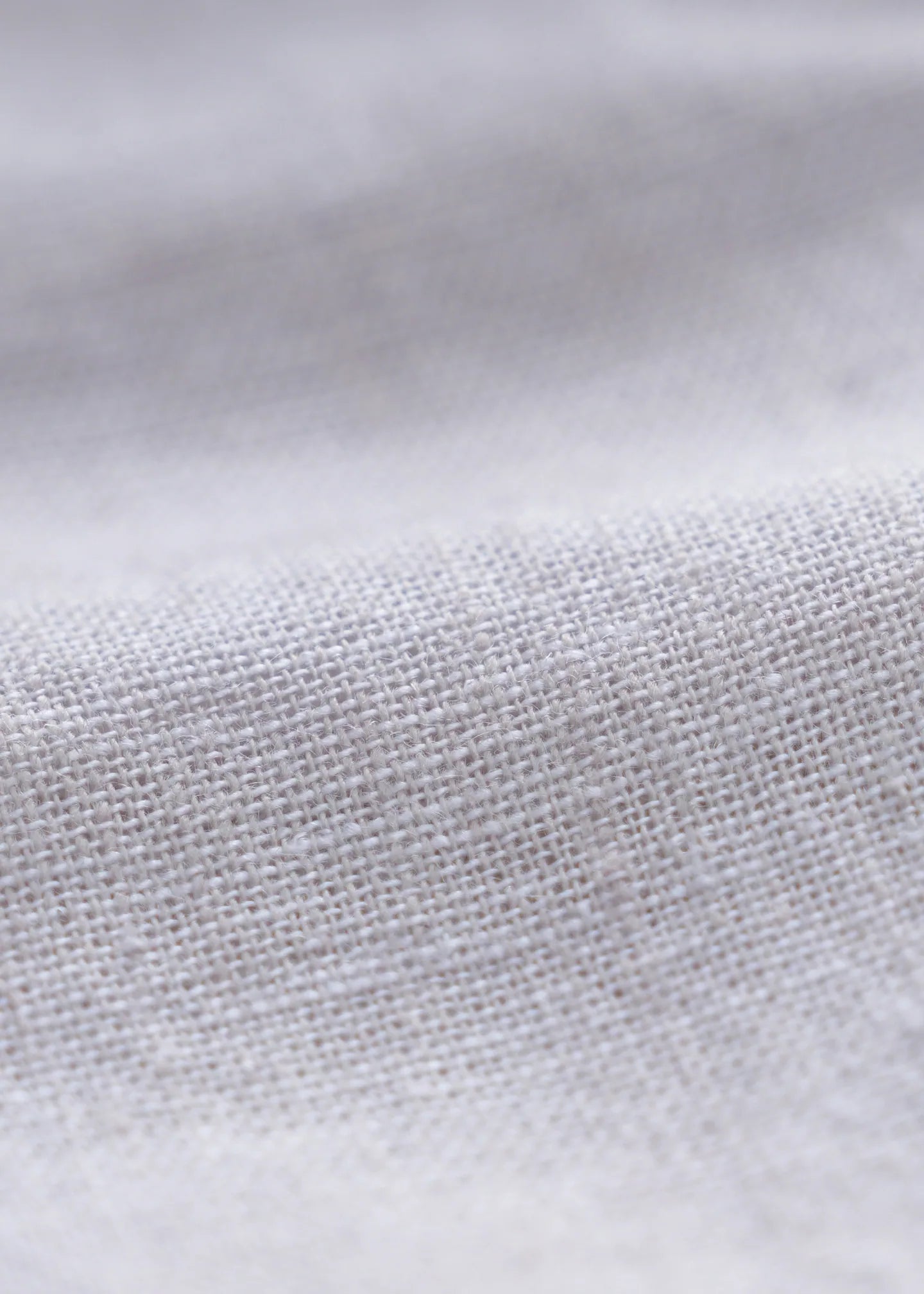 Linen fabric texture swatch with fine woven pattern