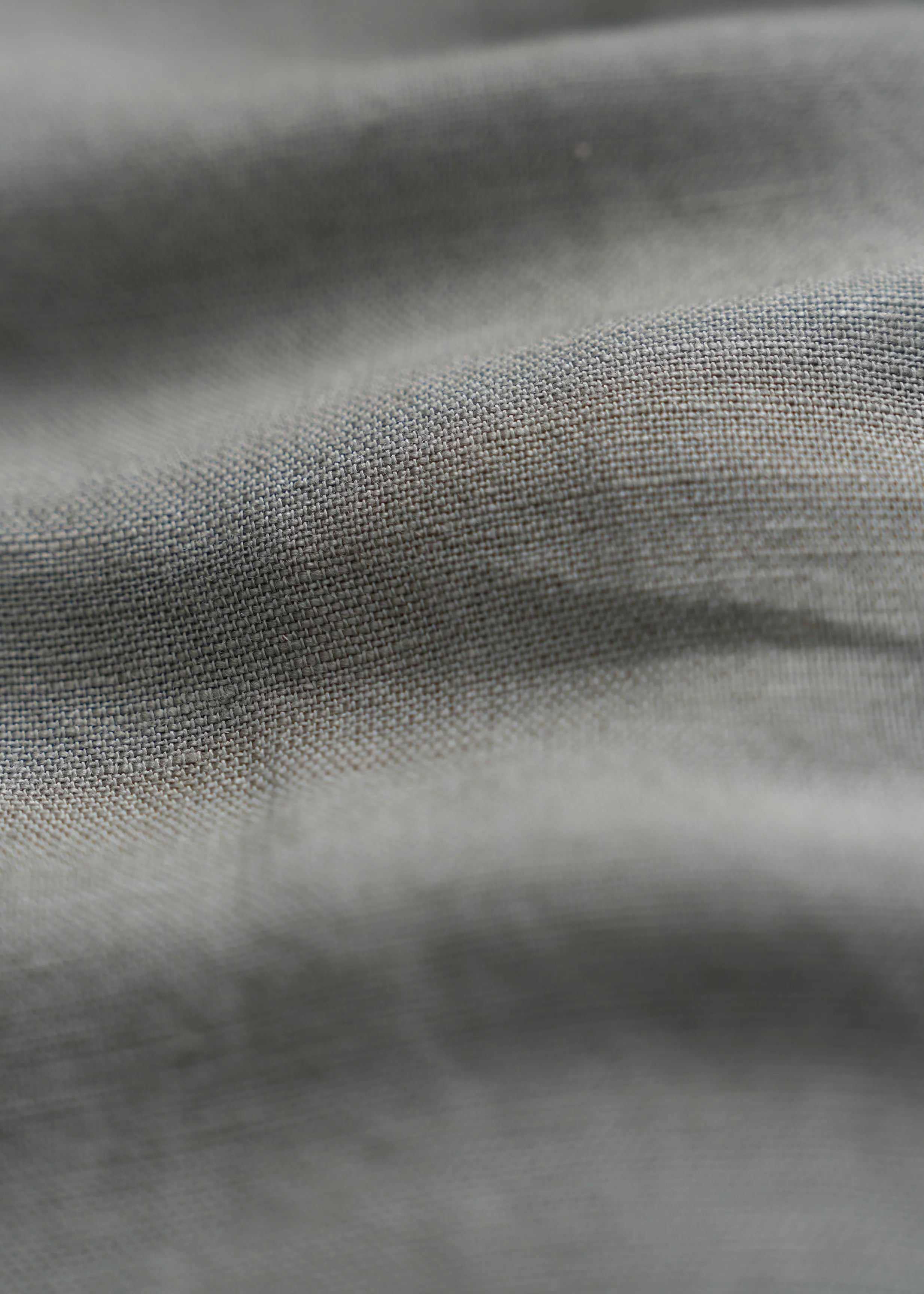 Light gray linen fabric with visible woven texture