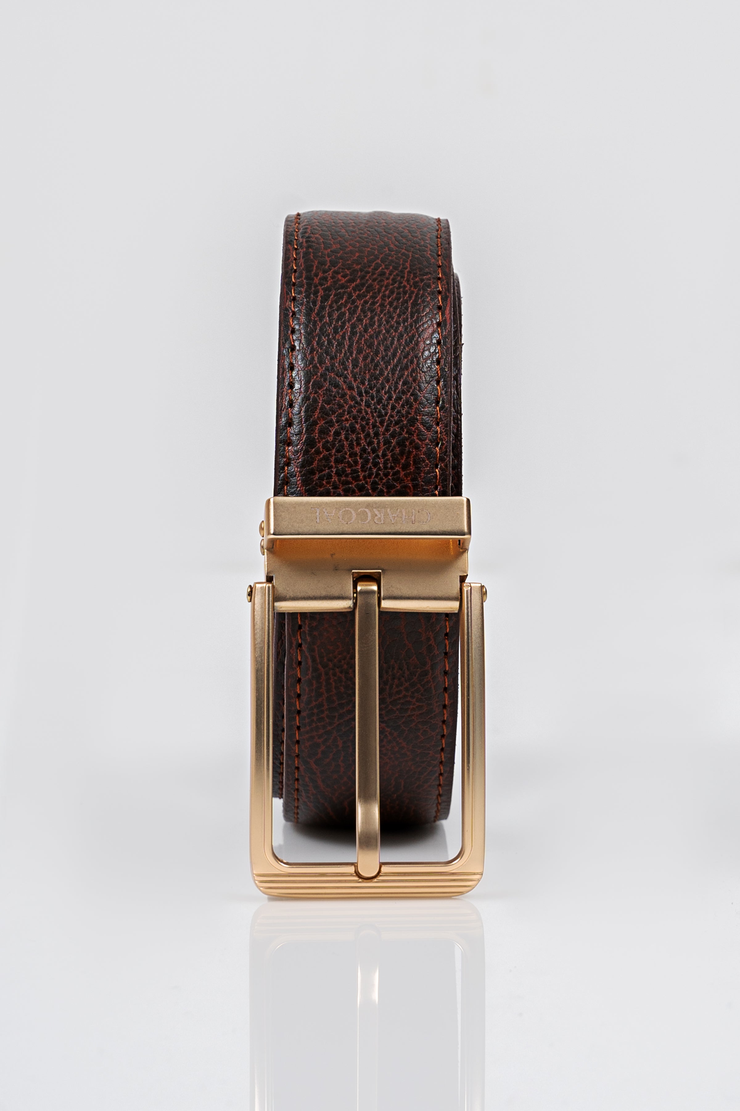 Brown leather formal belt with gold-tone buckle and adjustable strap holes