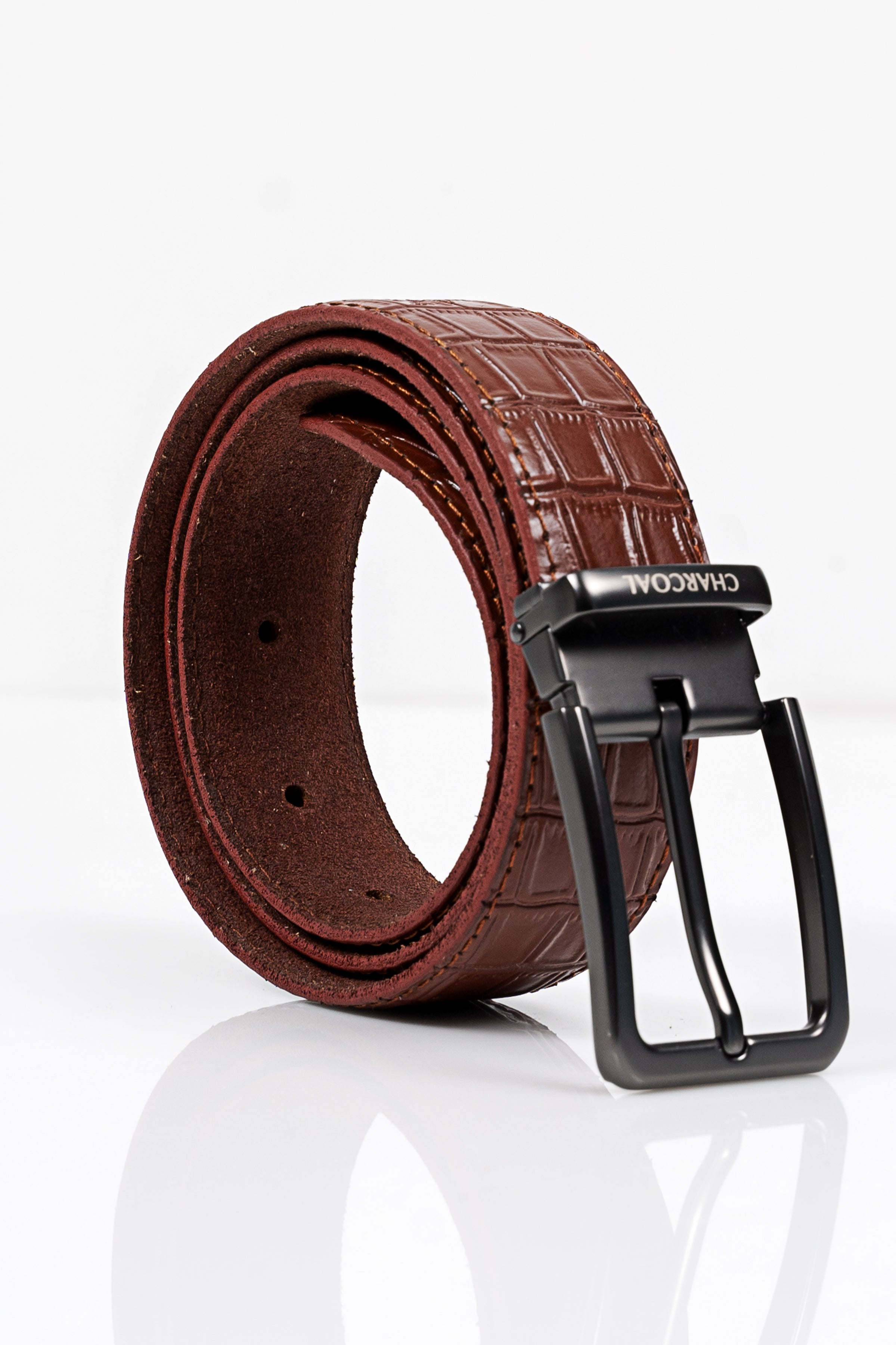 Brown crocodile-texture belt with black metal buckle and prong