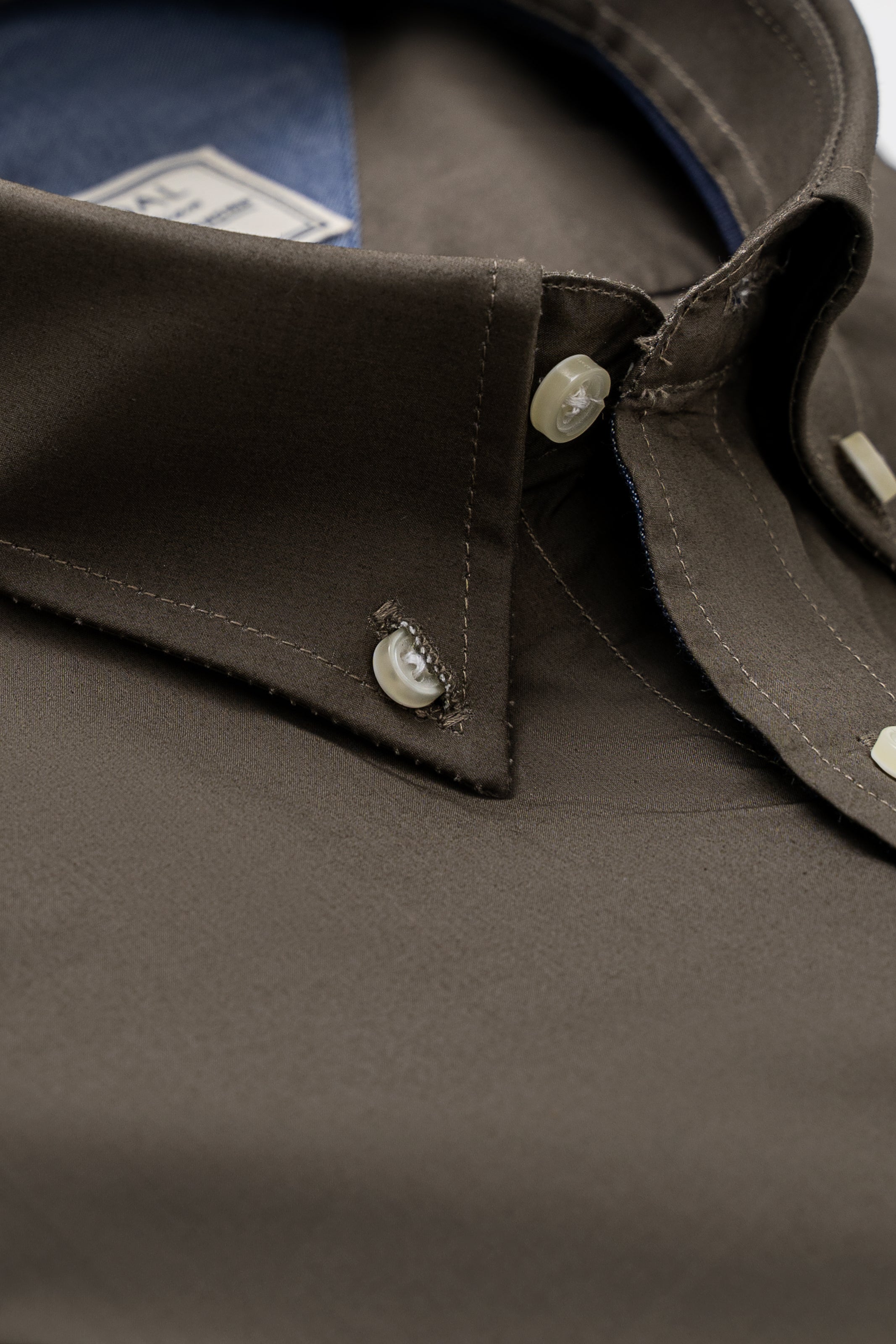 Limited edition dark olive shirt collar and buttoned placket detail
