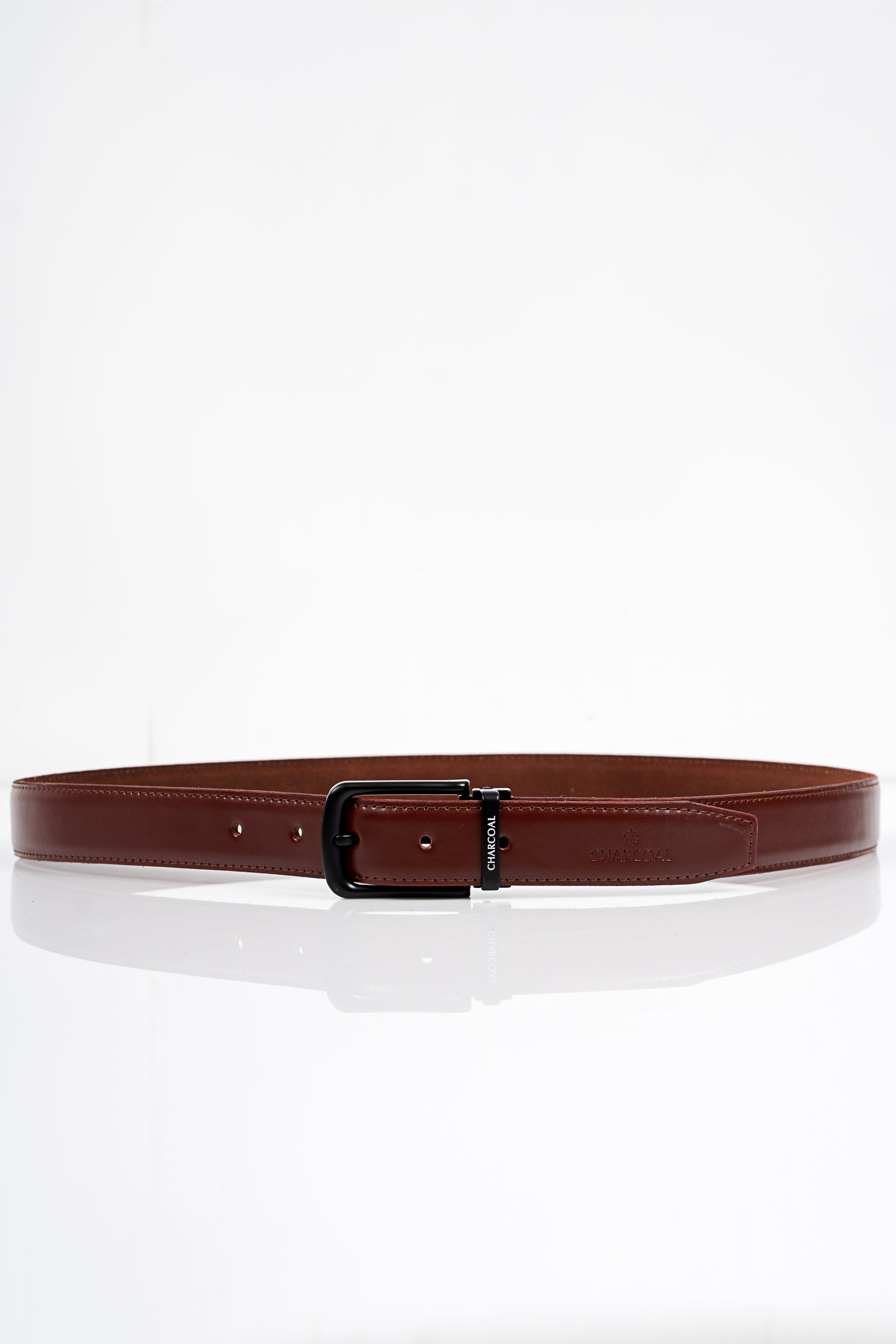Brown leather formal belt with black rectangular buckle and metal pin