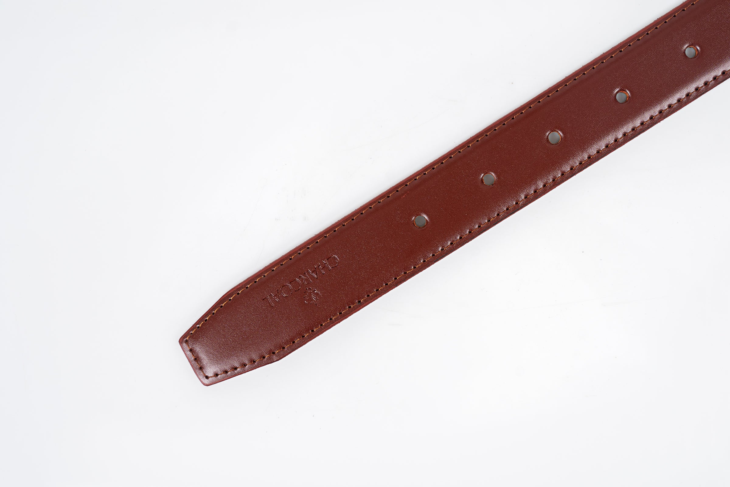 Brown leather belt strap with punched holes and edge stitching