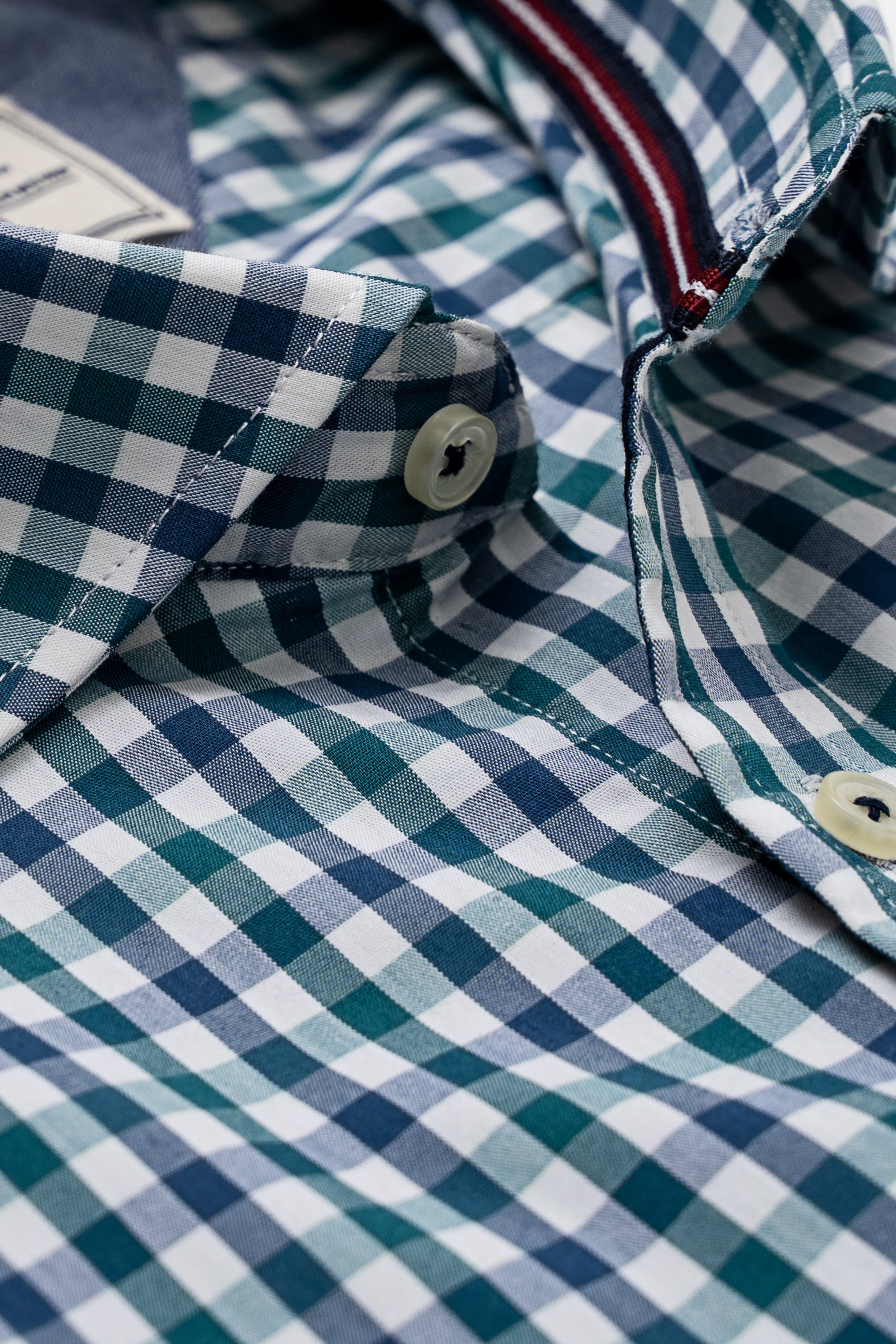 Limited edition check shirt close-up, button placket and turn-down collar