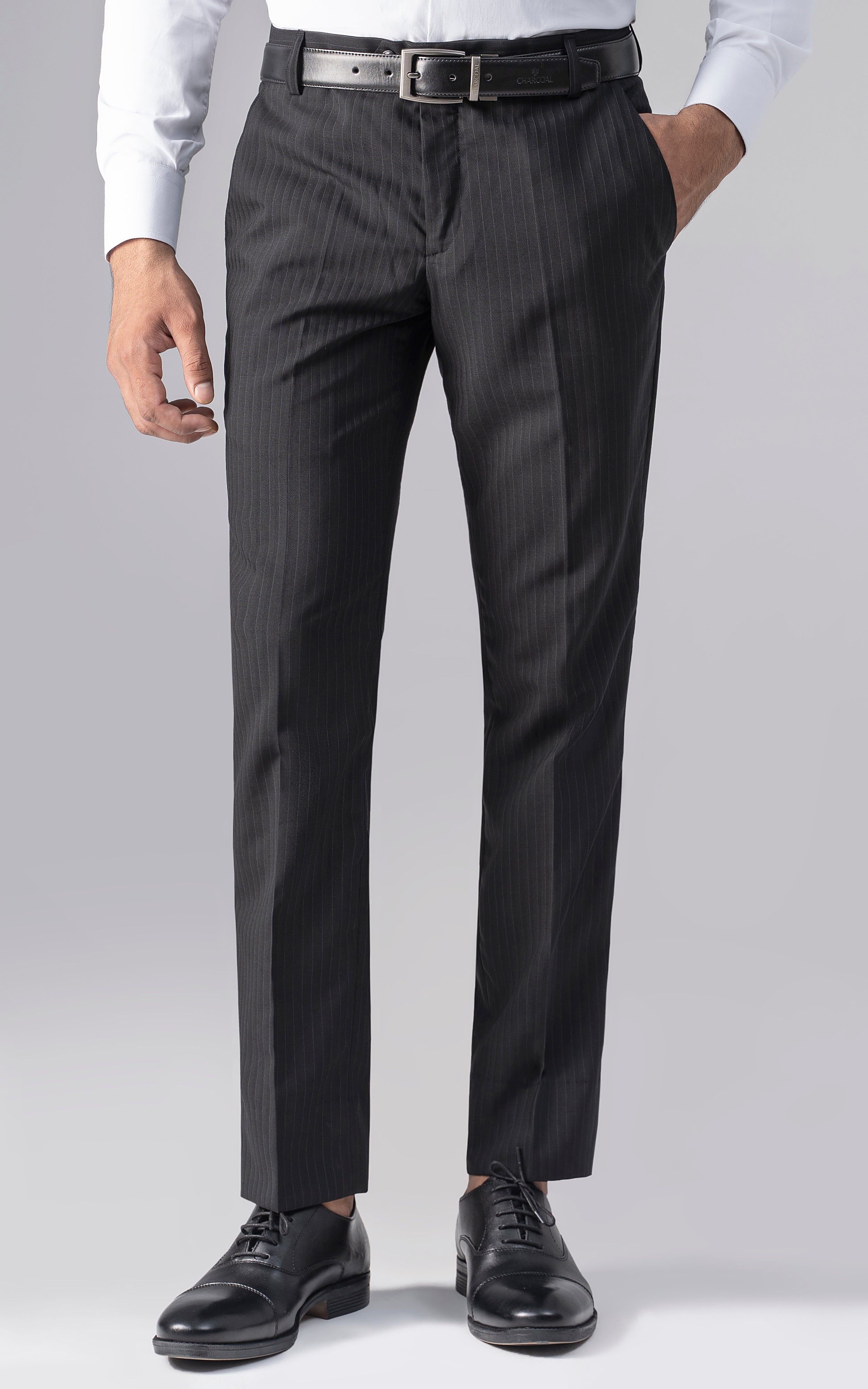Slim-fit black dress pants with button waistband and straight fit