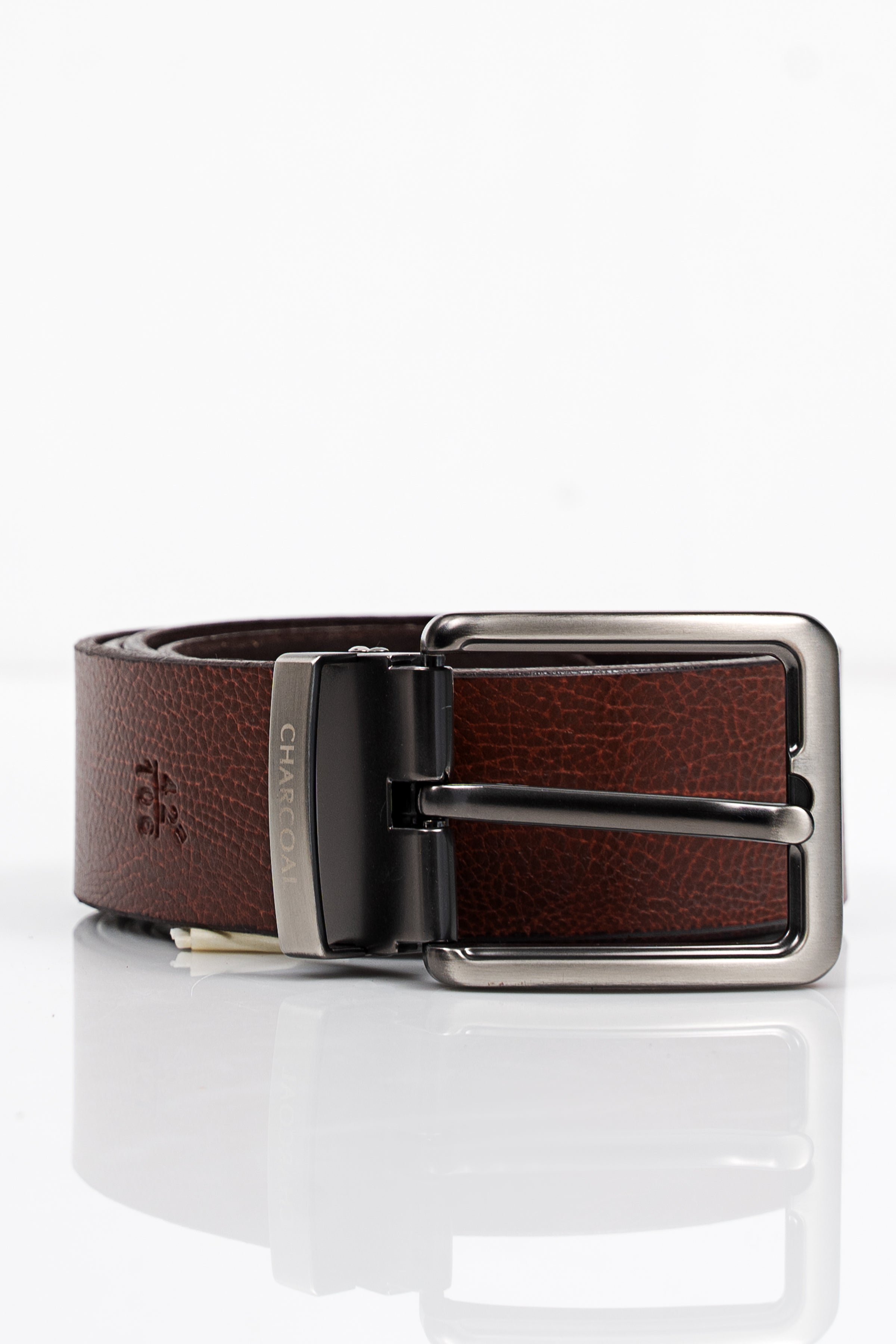 Brown leather belt with rectangular silver buckle and keeper, textured grain finish