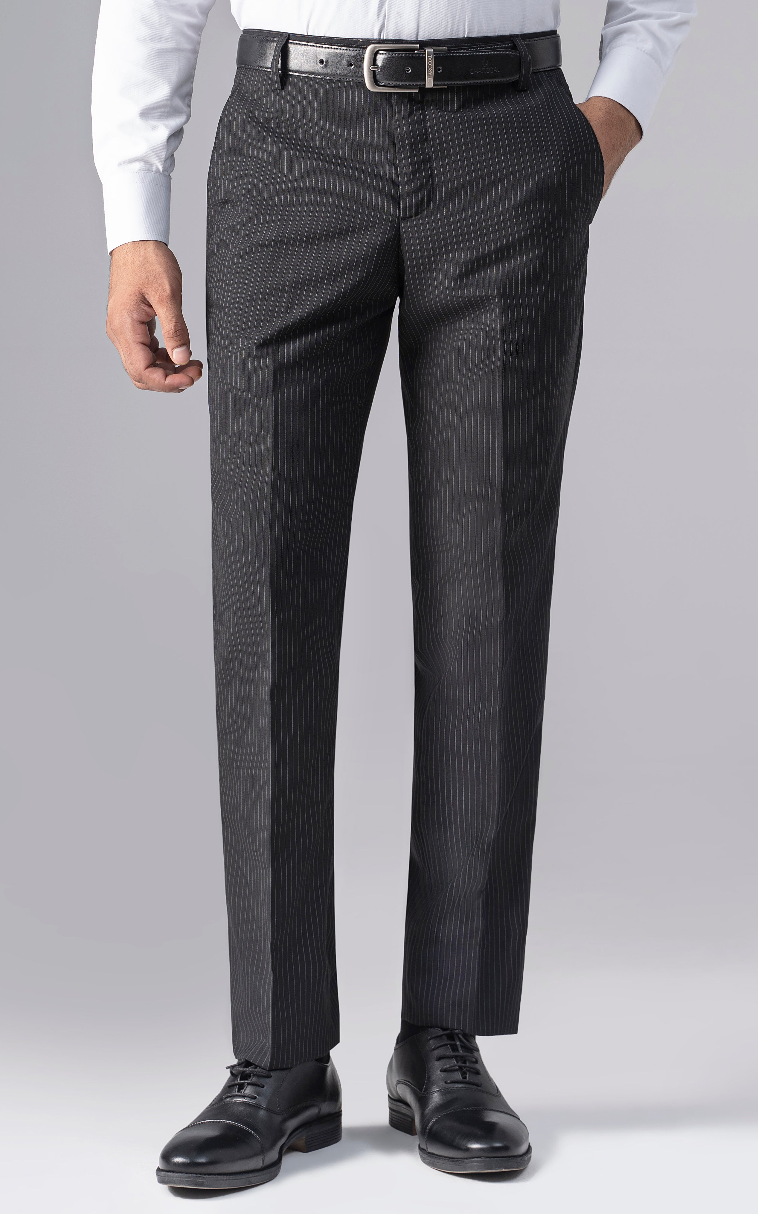Slim-fit black pinstripe dress pants, back view with belt loops