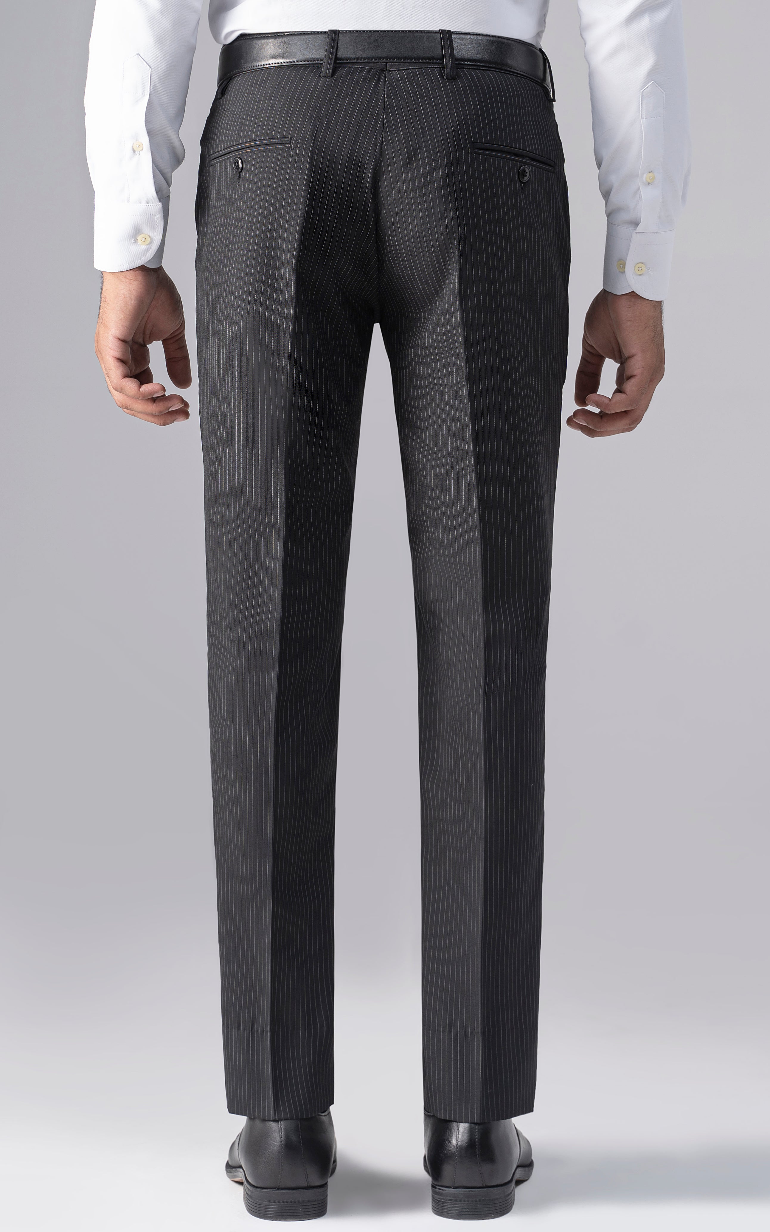 Slim-fit black pinstripe dress pants, front view with belt loops