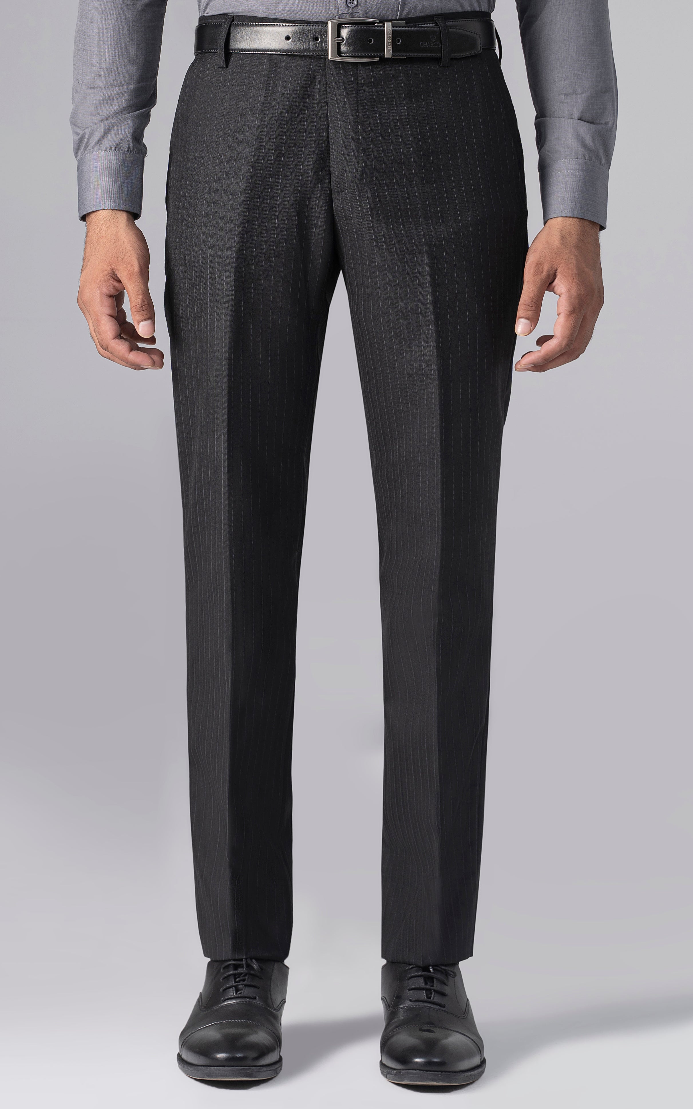 Slim-fit dress pants front view with belt loops and vertical pinstripes, tapered straight leg