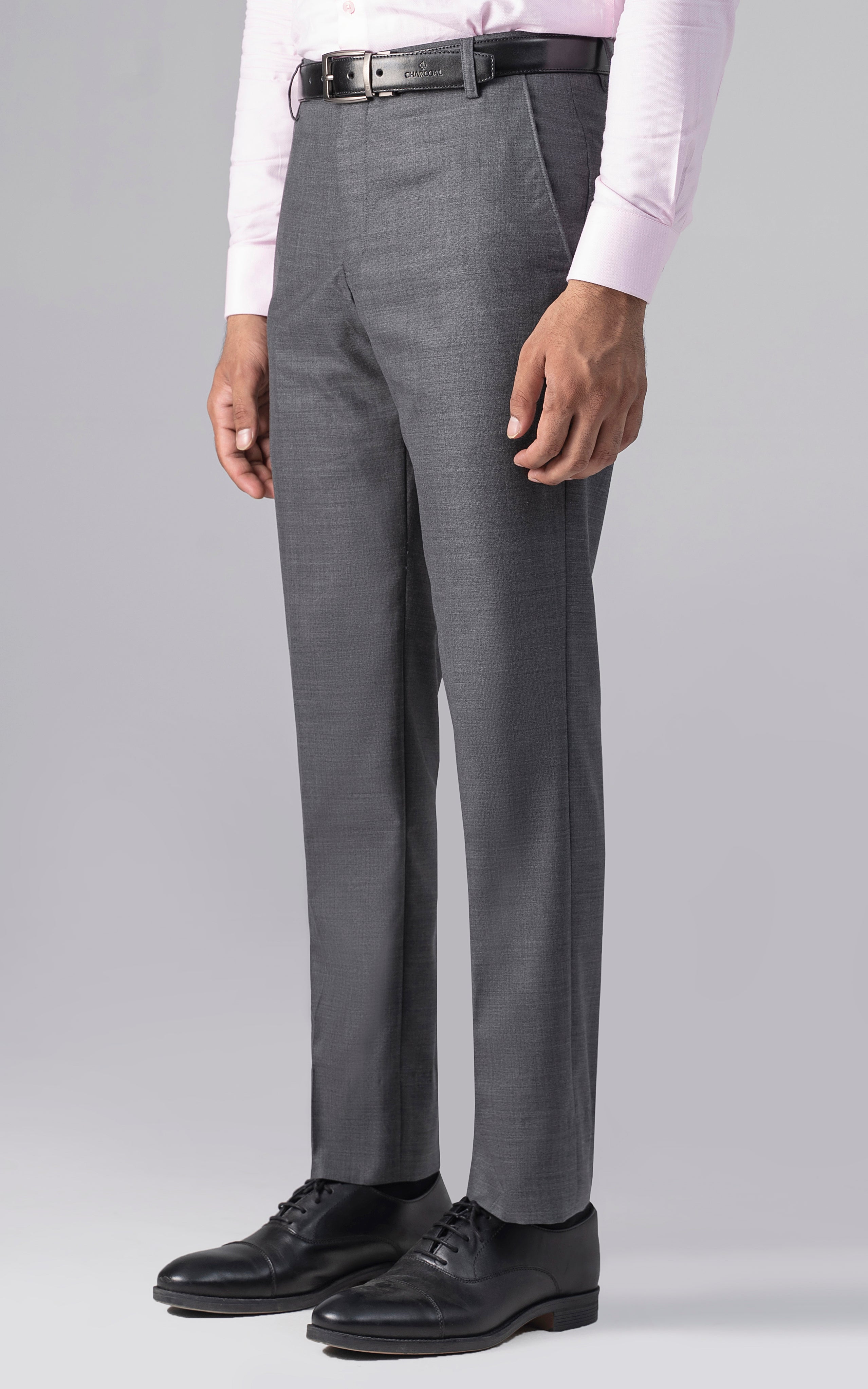 Grey slim-fit dress pants with belt, tapered legs and side pockets