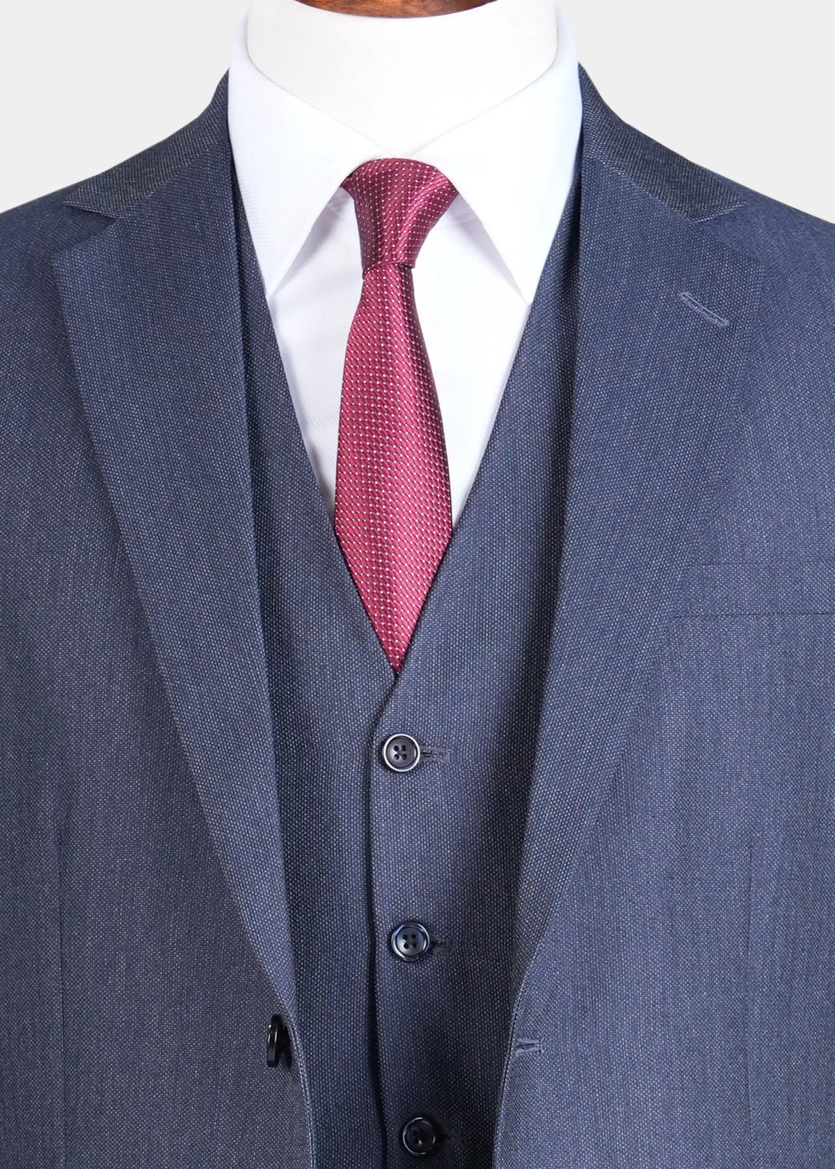 Teal blue suit vest and jacket with notch lapel; red patterned necktie, button front.