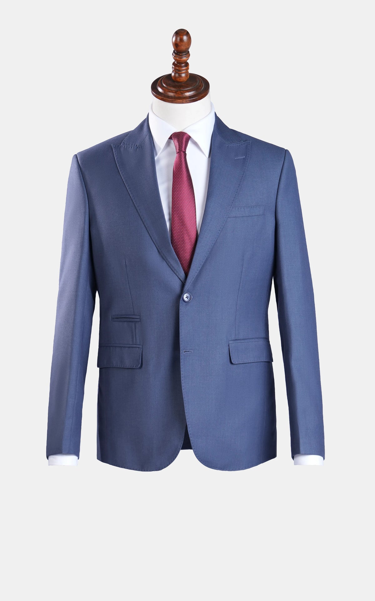 Bluish grey slim-fit suit jacket, front view on mannequin with tie and shirt.