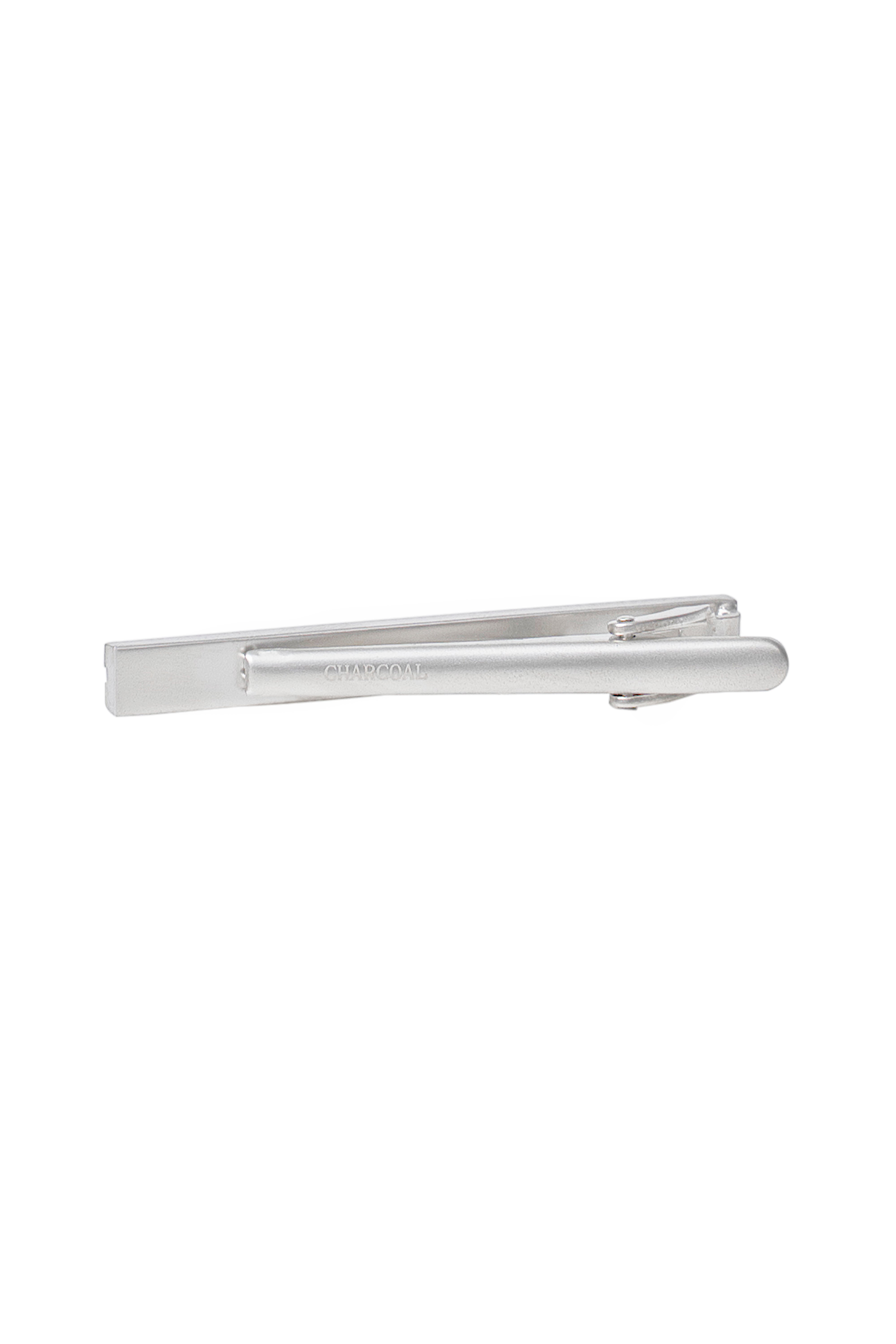 Silver tie bar pin with hinged clasp, side view, polished metal bar.