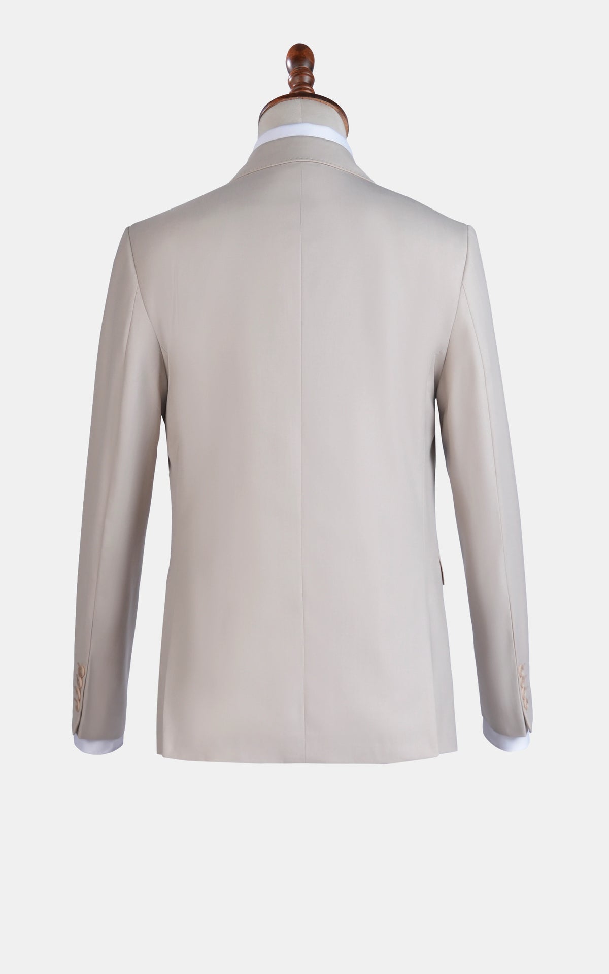 Cream suit jacket back view on mannequin, smooth shoulders and seam lines
