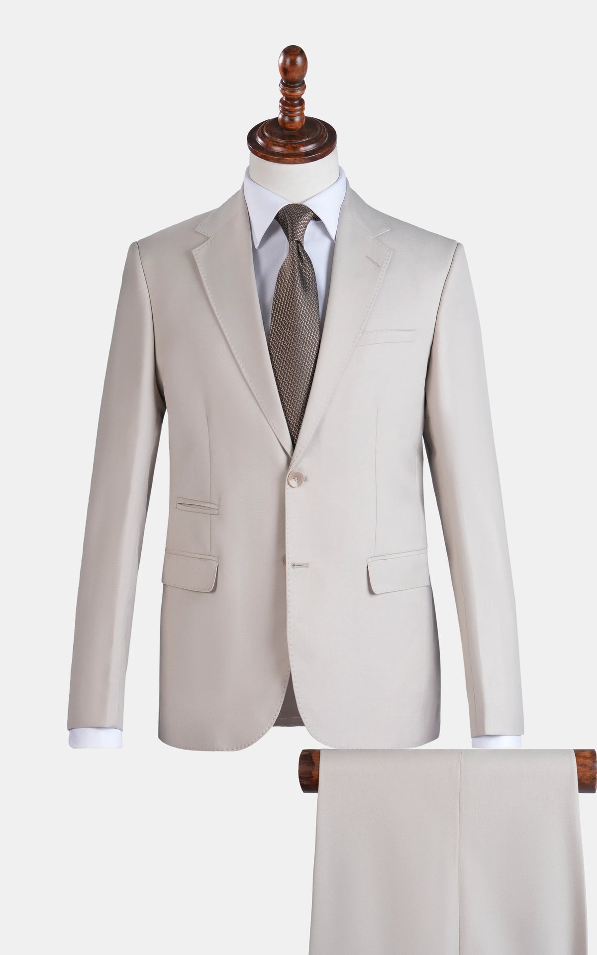 Cream suit jacket, notch lapels, single flap pockets, two-piece set on mannequin