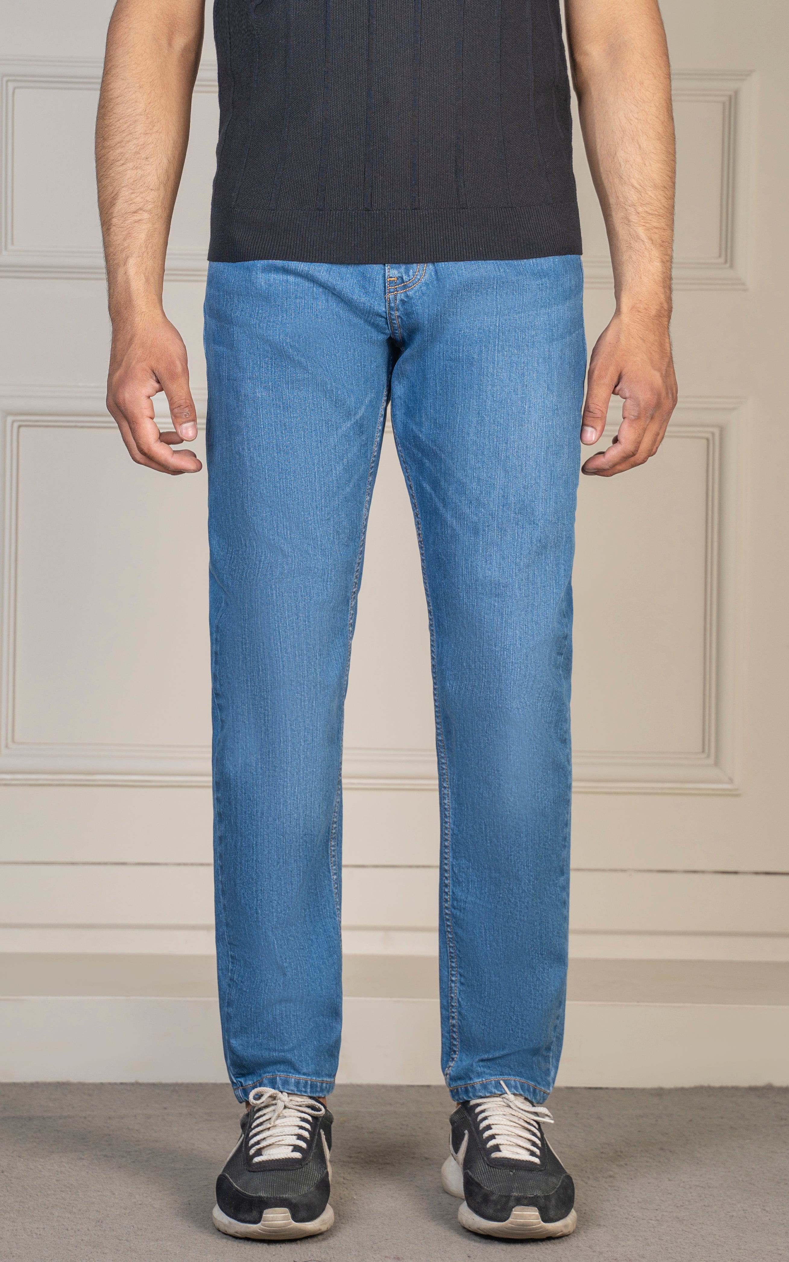 REGULAR TAPERED FIT JEAN MID BLUE