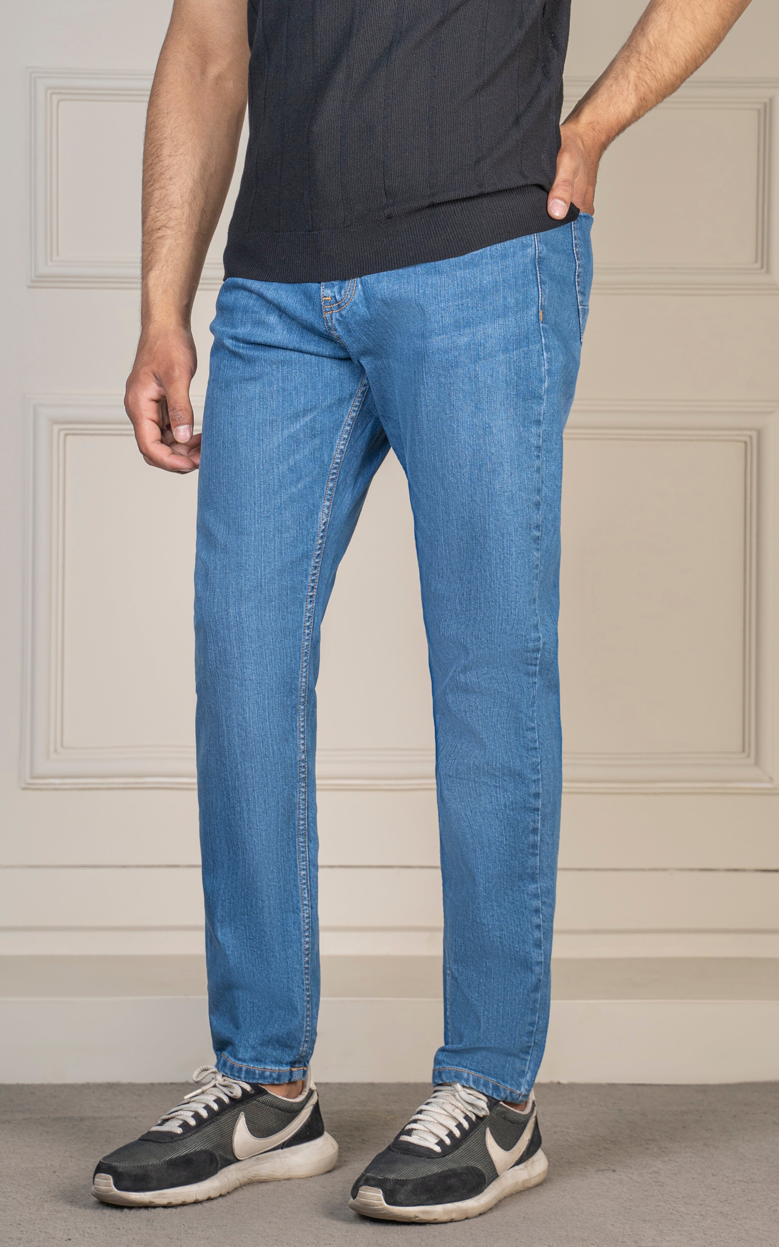 REGULAR TAPERED FIT JEAN MID BLUE