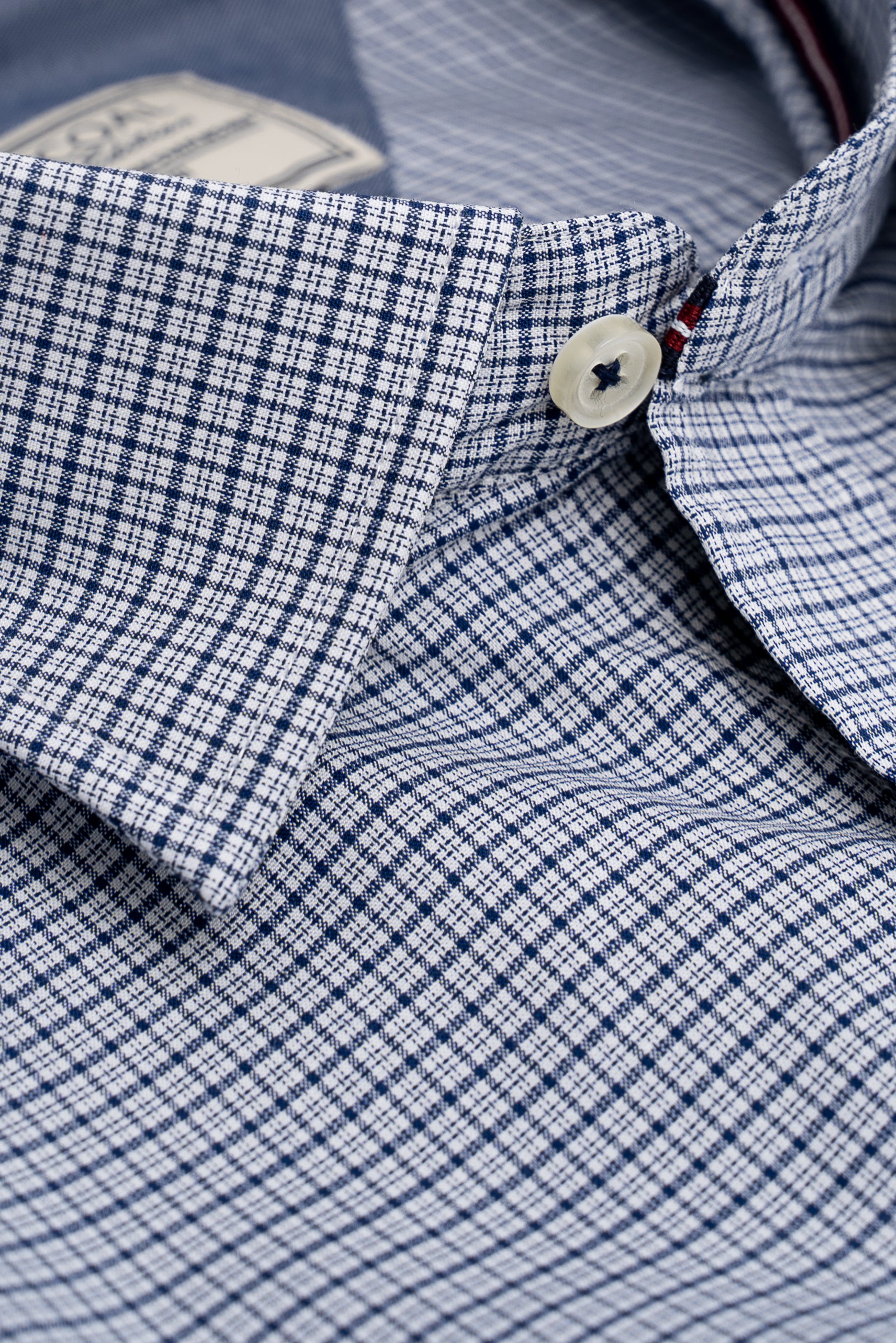 Blue and white check shirt collar with buttoned placket detail