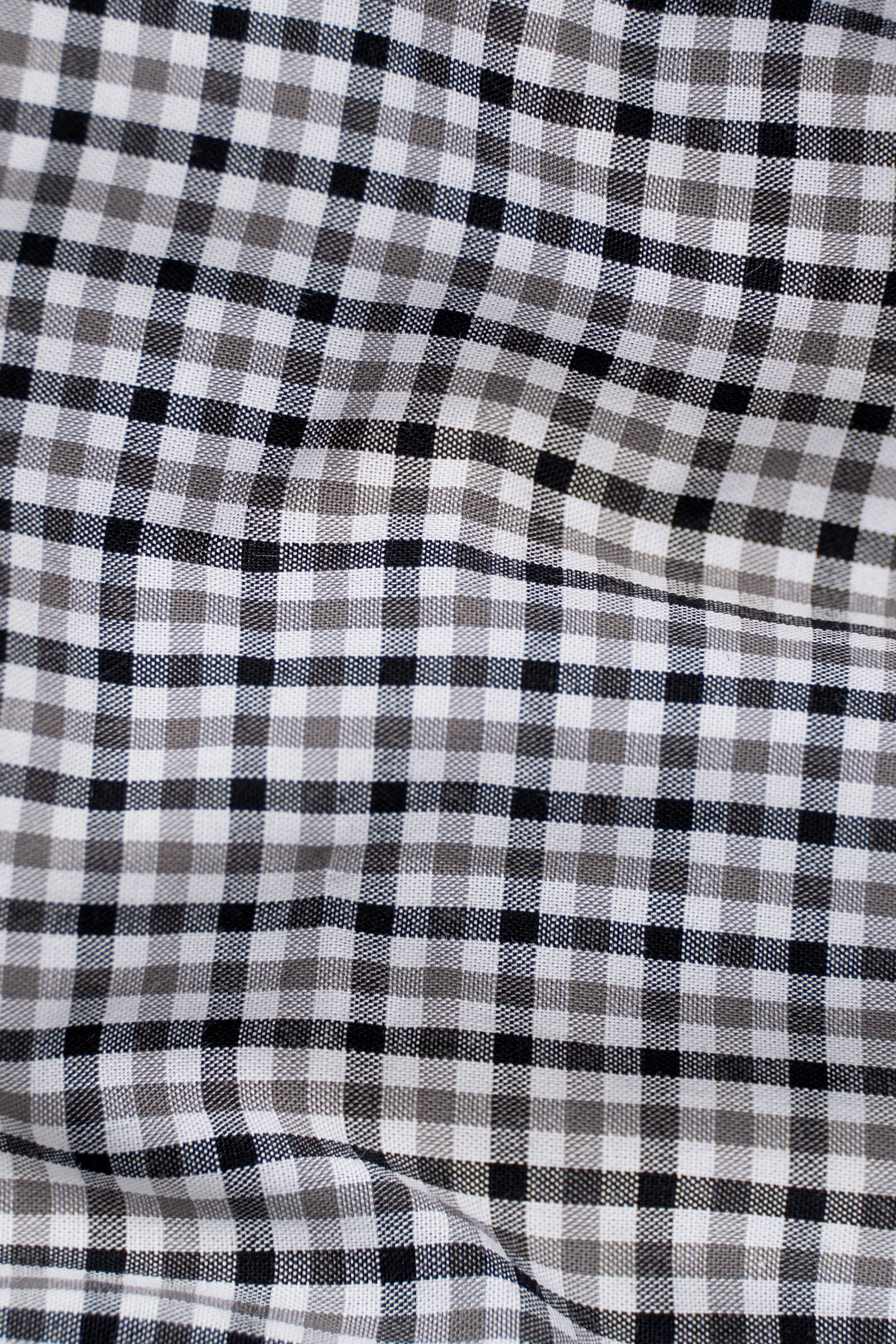 Black-and-white check shirt fabric close-up