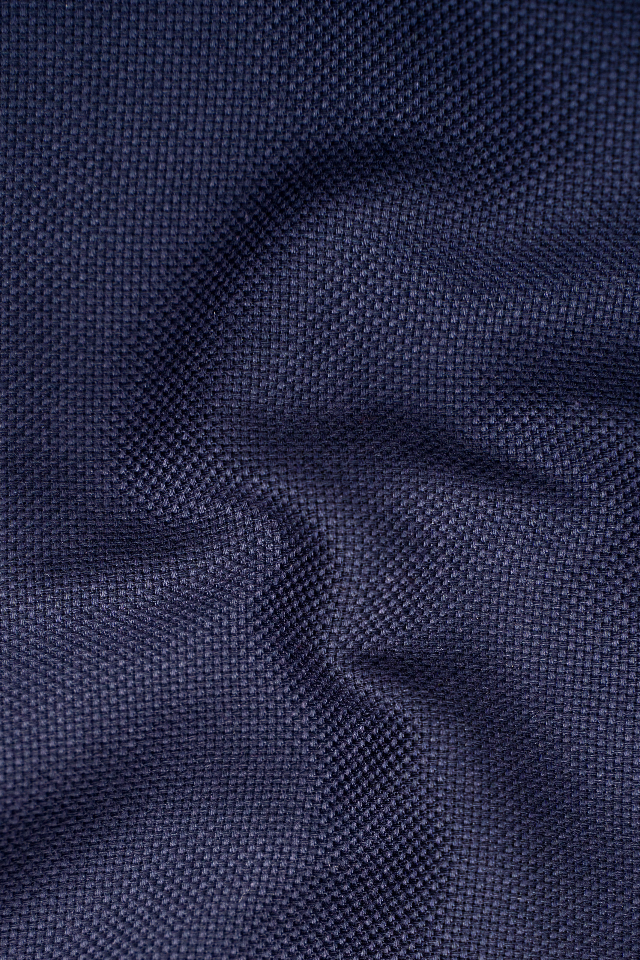 Navy shirt fabric swatch with fine woven texture