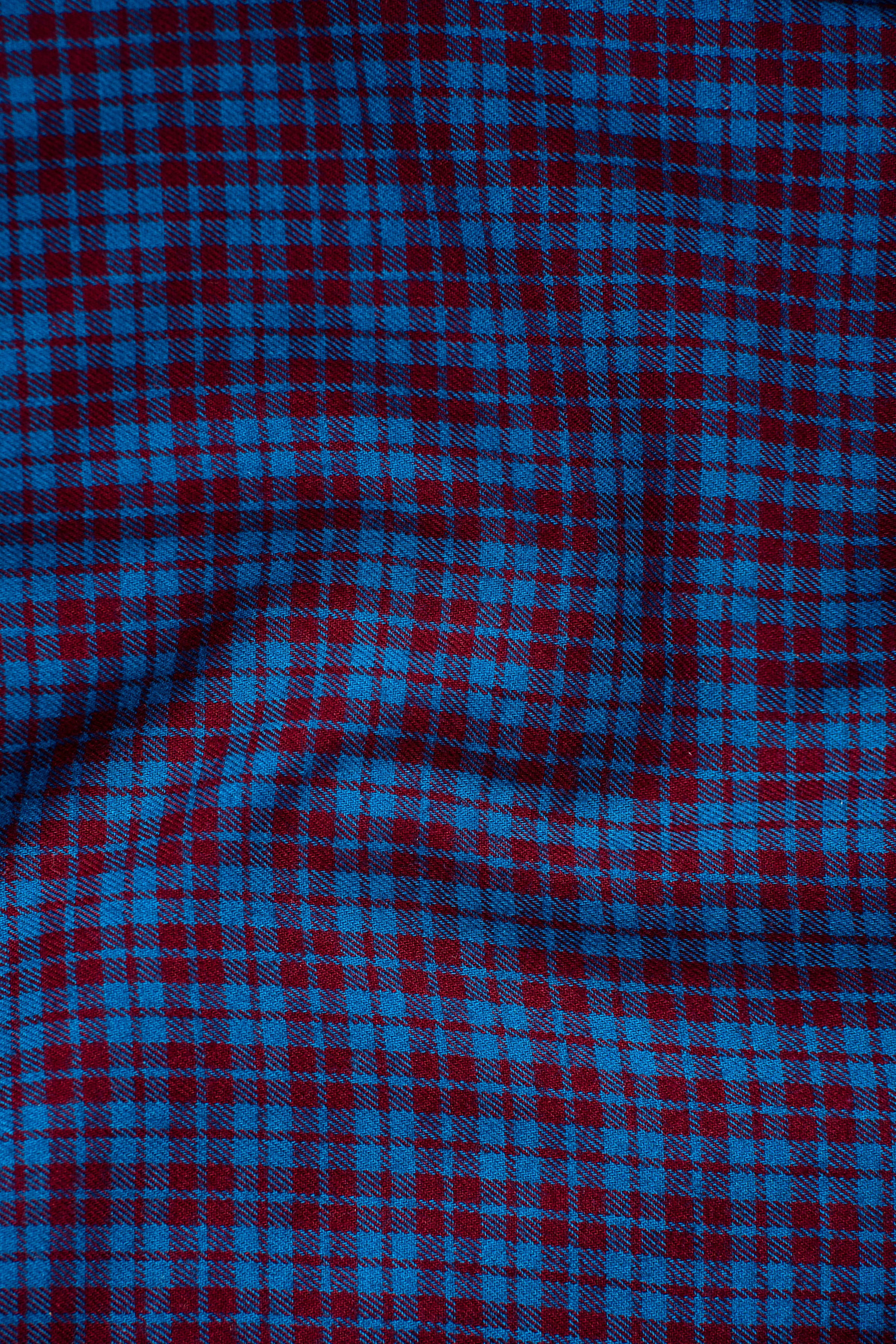 Blue and maroon check shirt fabric texture
