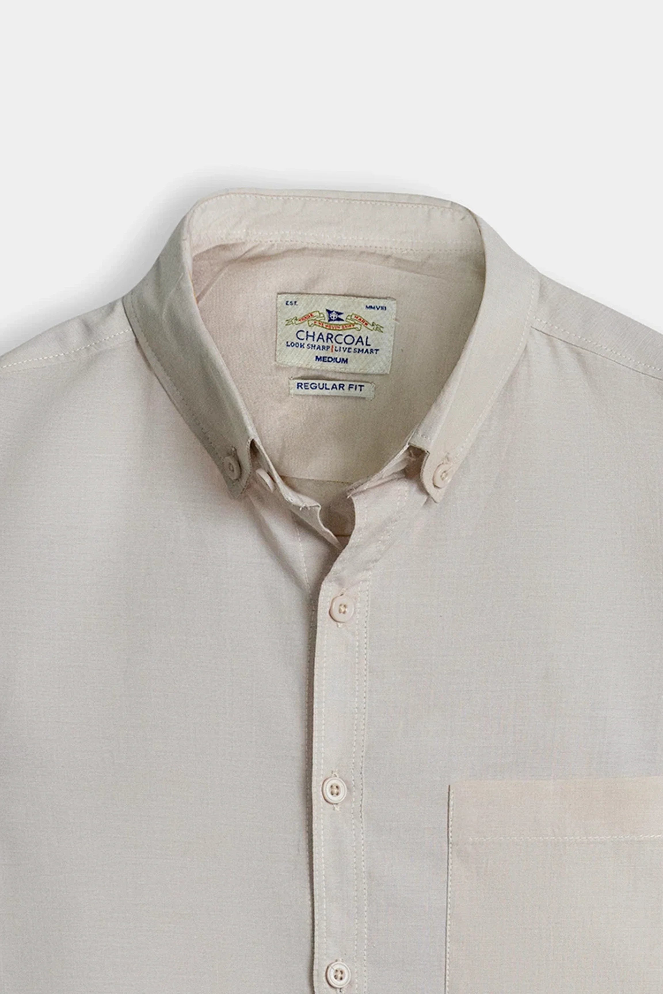 Khaki button-down shirt collar and buttons, inside label near neckline.