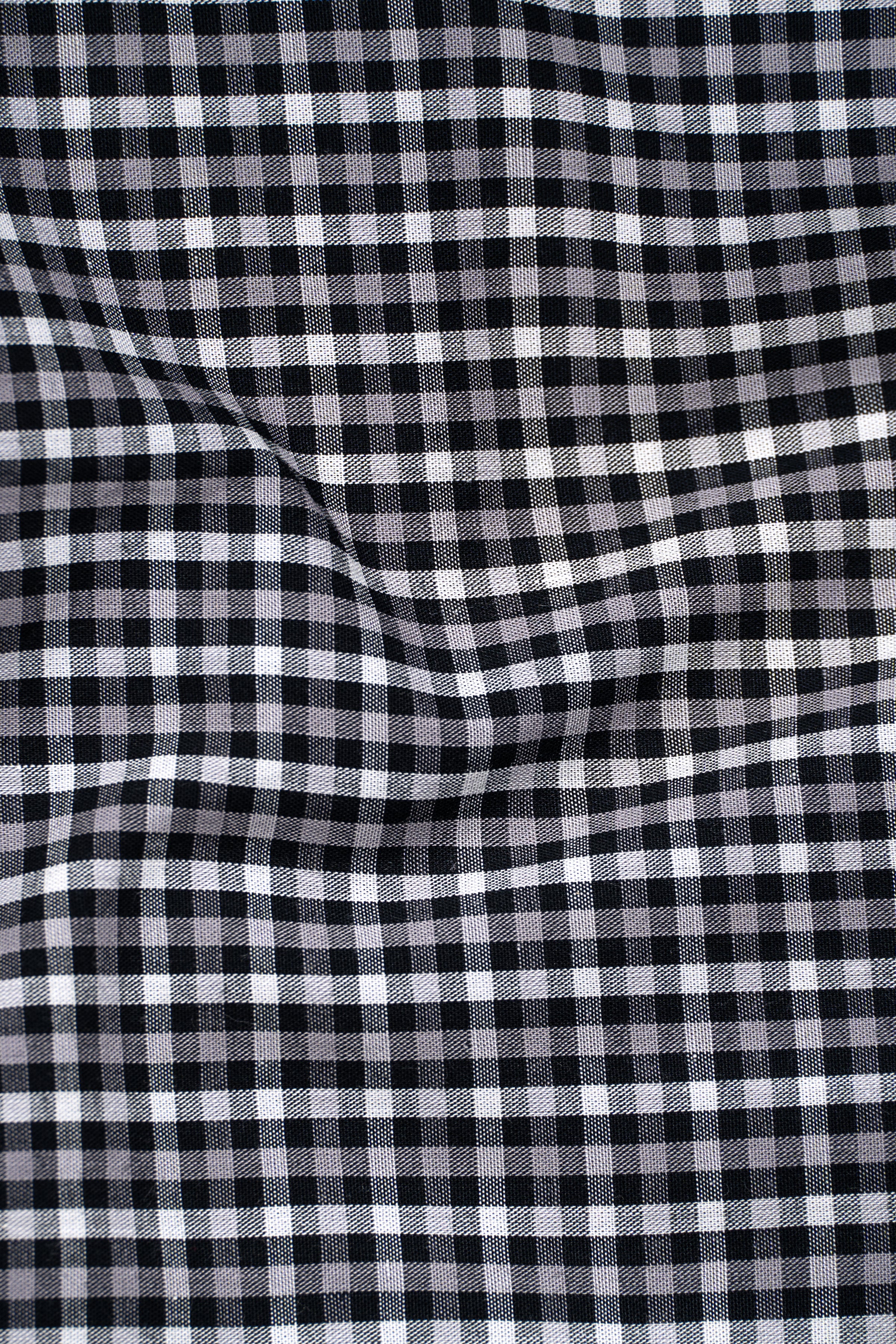 Black and white check shirt fabric close-up