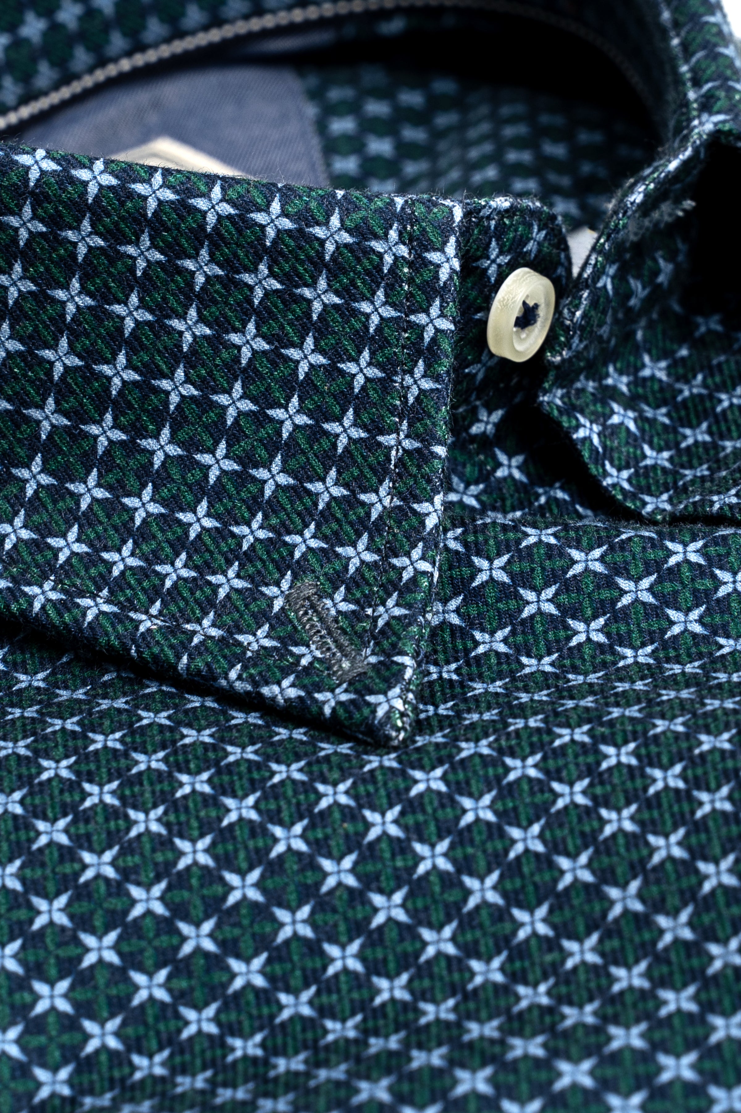 Limited edition shirt collar and front placket with geometric green, white, and navy pattern