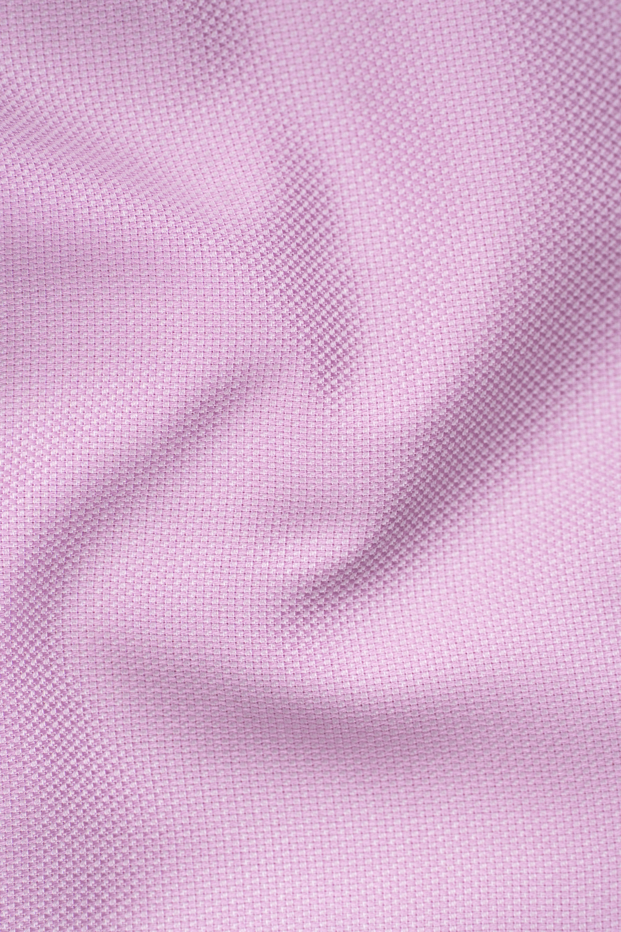 Pink limited edition dress shirt fabric texture close-up