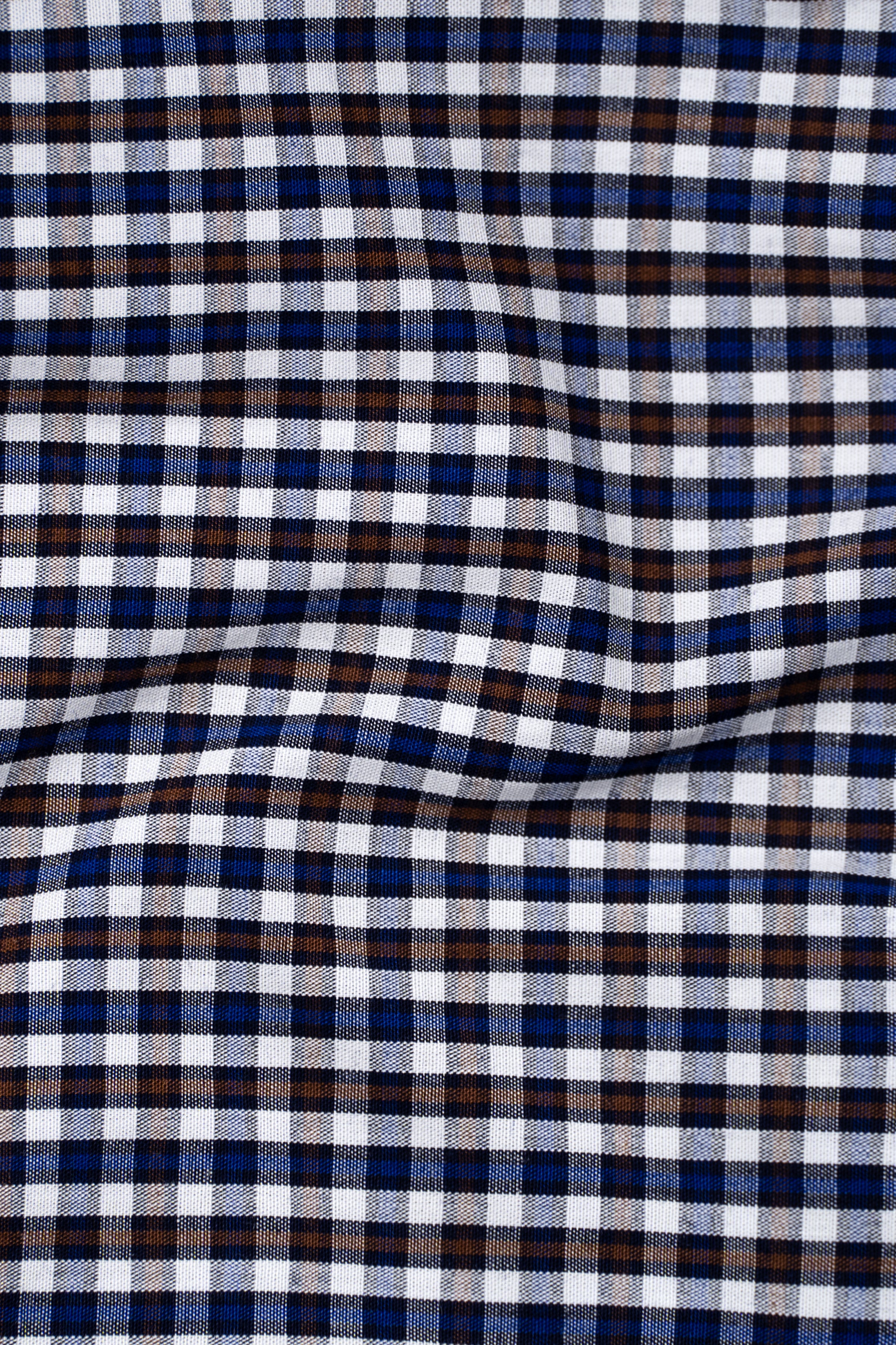 Blue, white and brown check fabric swatch with crisp plaid pattern