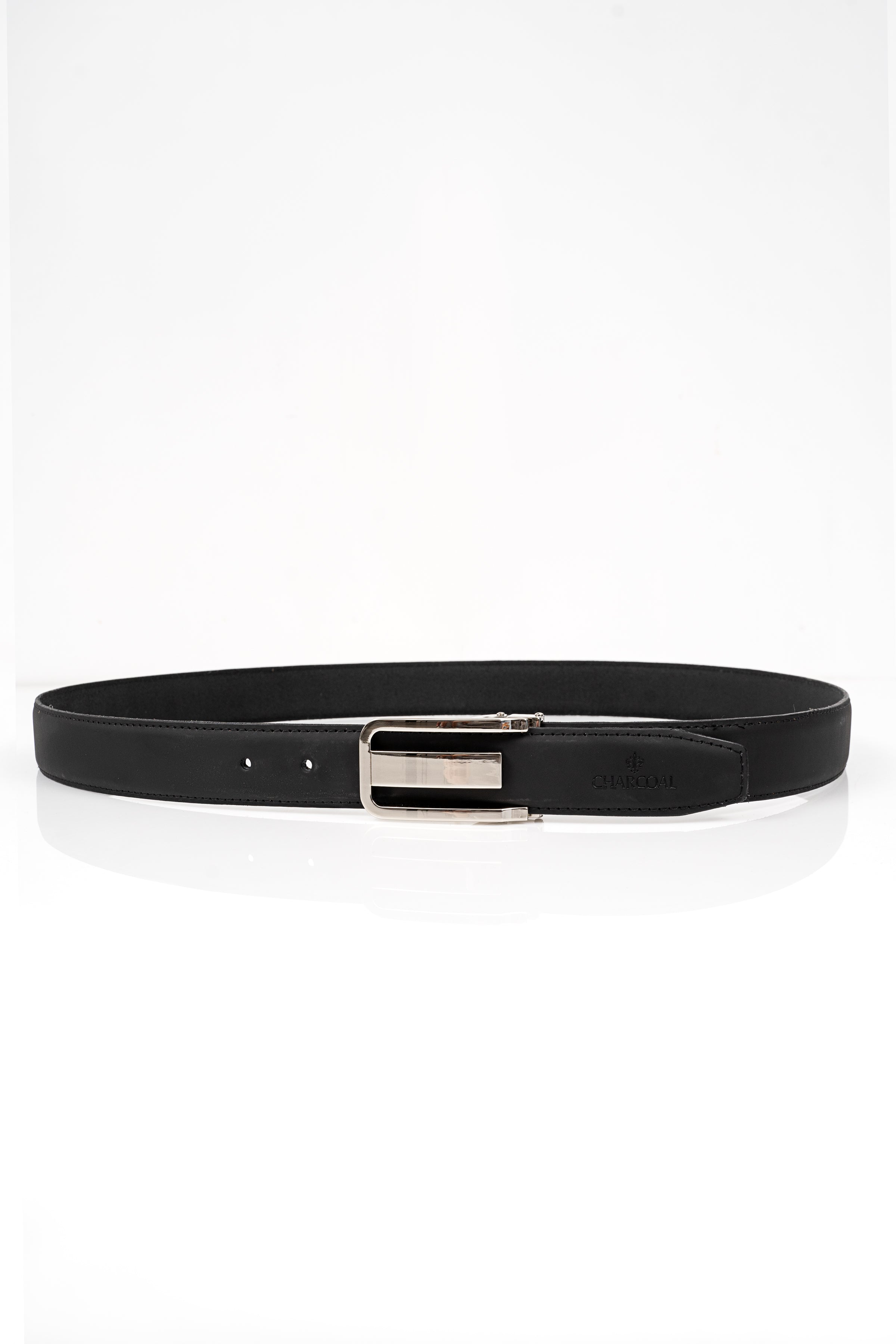 Black formal belt lying flat with silver buckle and single keeper
