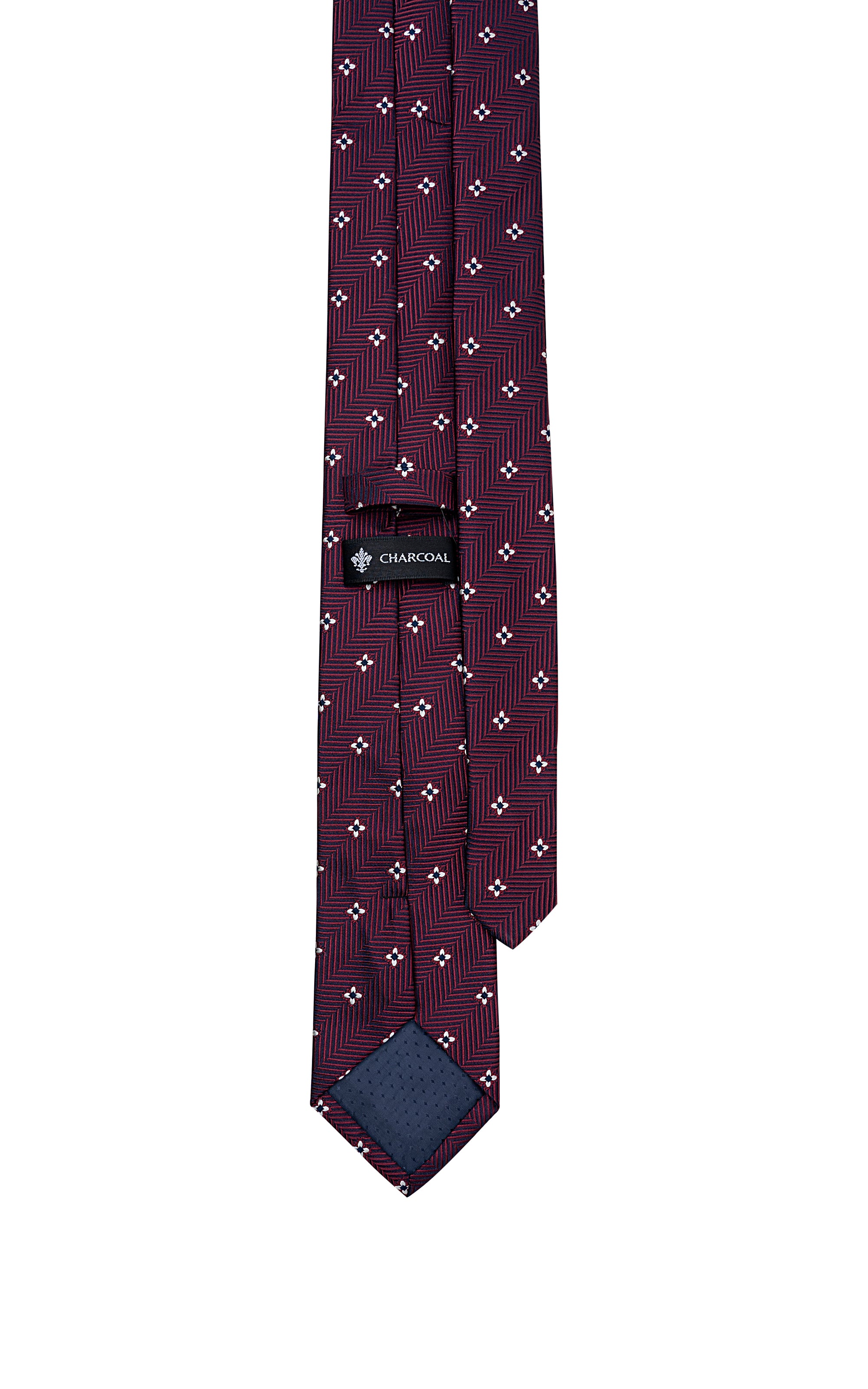 Burgundy tie with small white motifs and Charcoal brand keeper