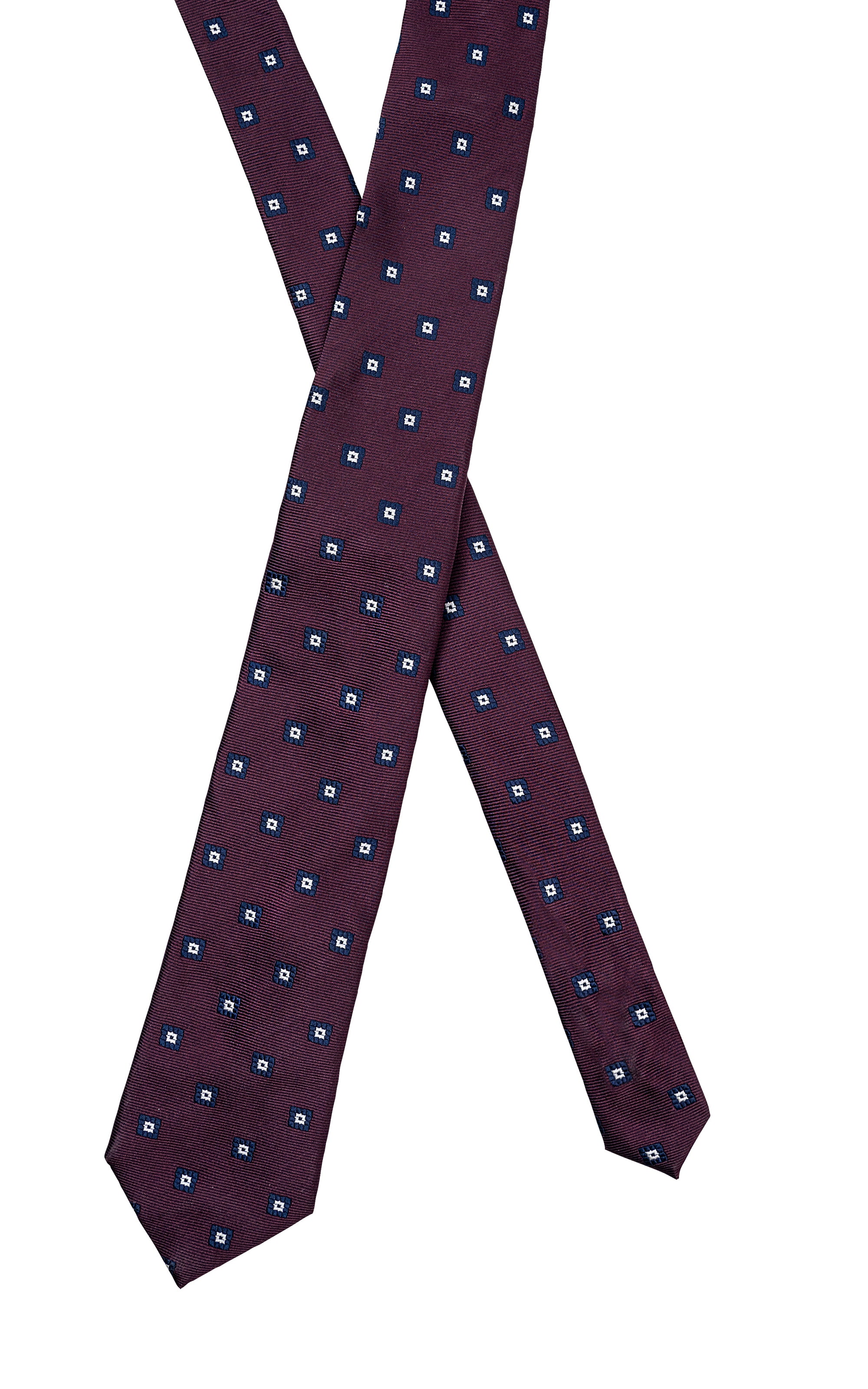 Poly silk tie, dark purple with scattered blue square pattern, folded across