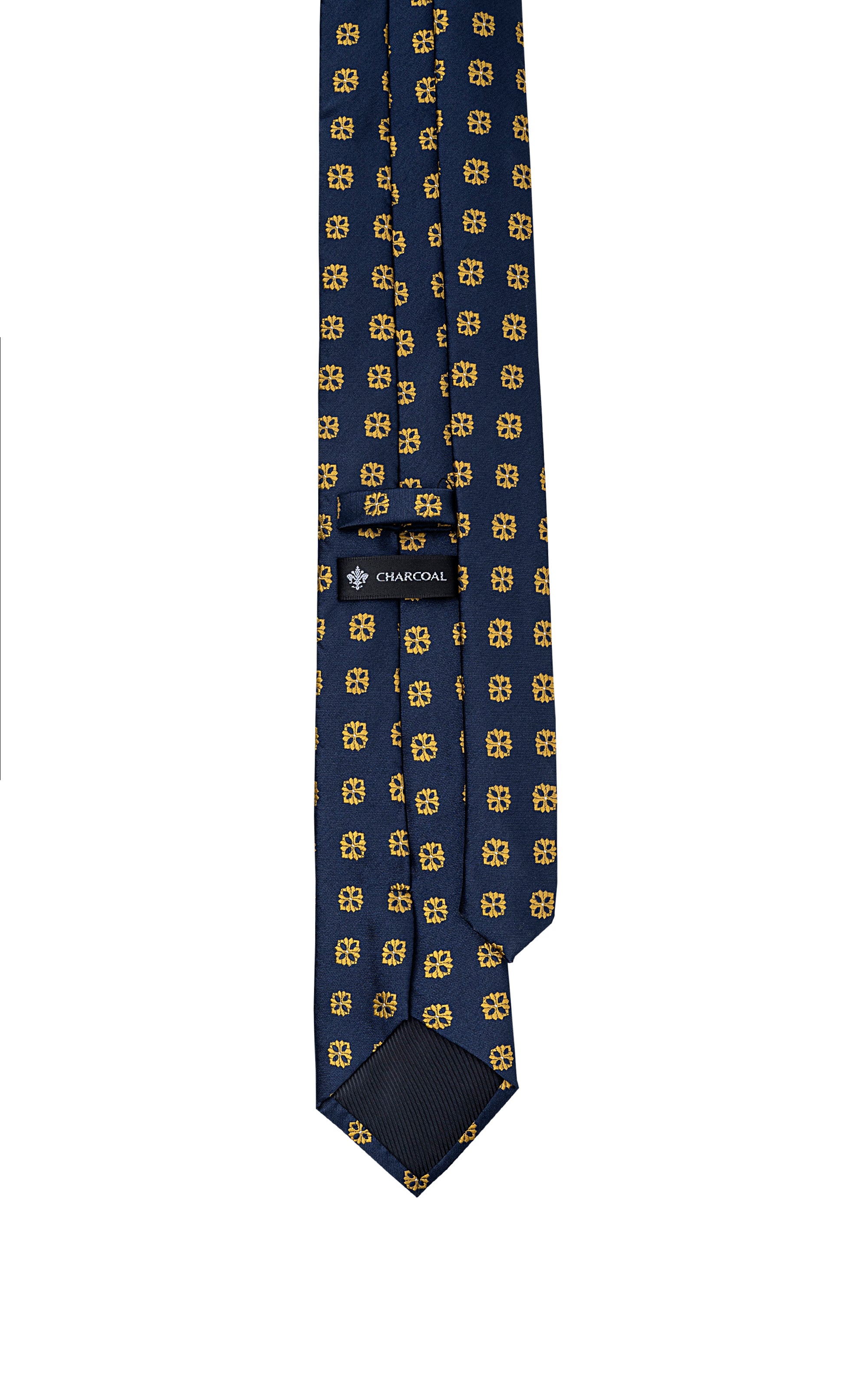Navy poly-silk tie with small repeating yellow motifs and pointed tip