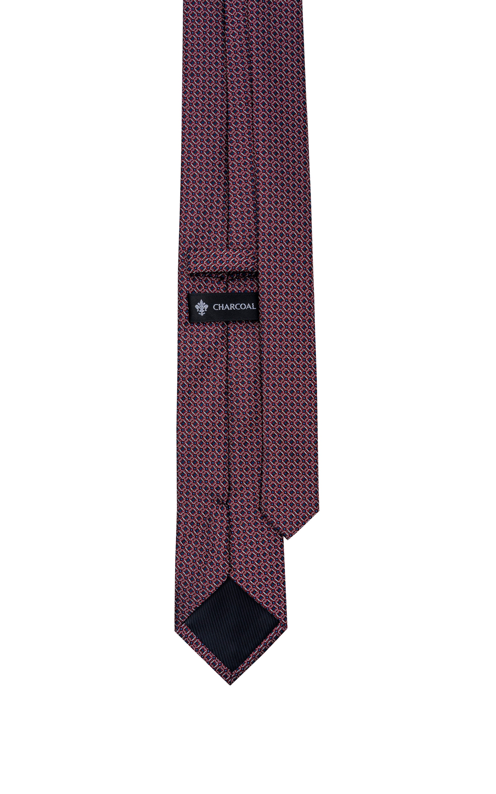 Poly silk tie with maroon repeating geometric pattern and keeper label