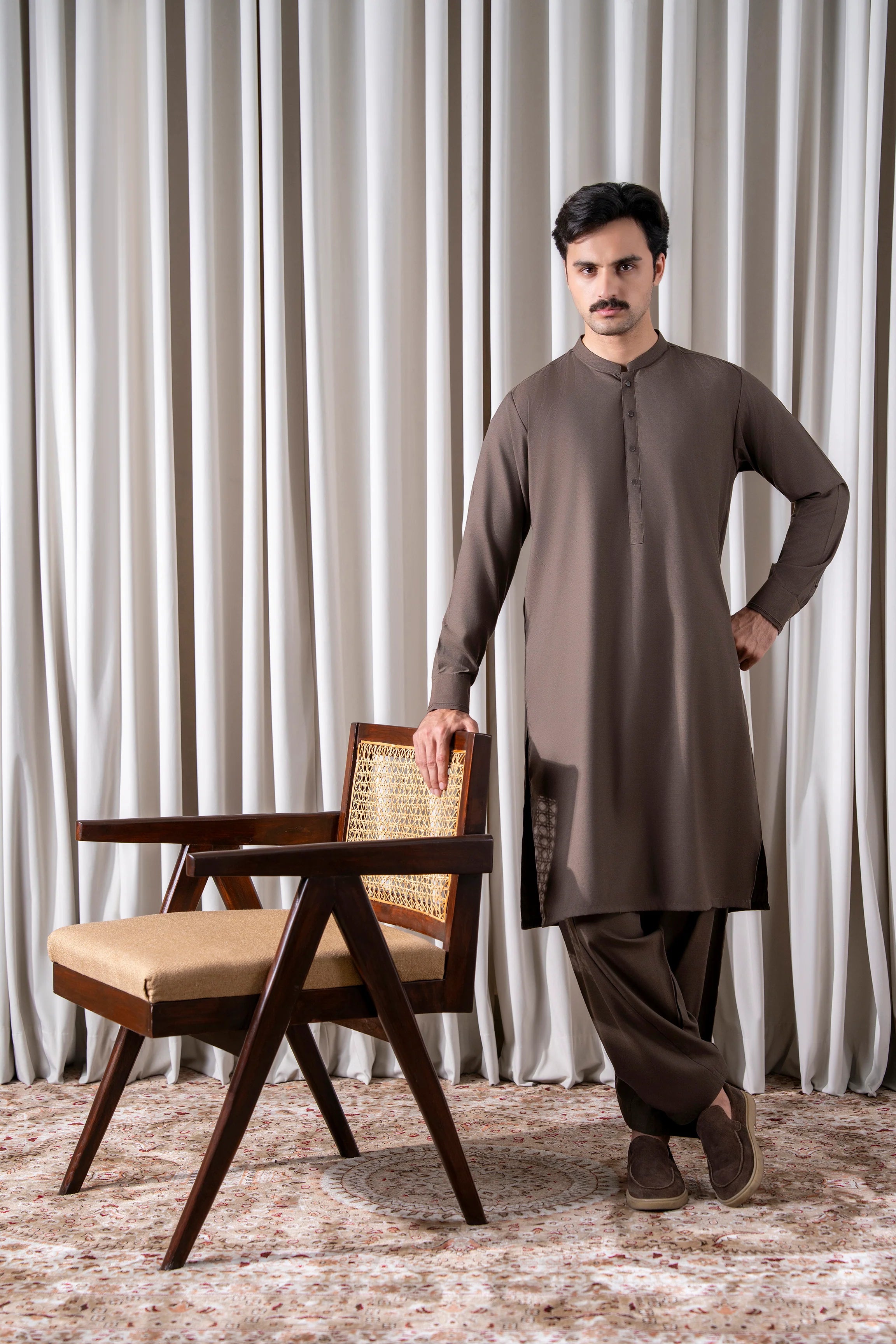 Dark brown textured kameez shalwar set, full outfit view with matching shalwar