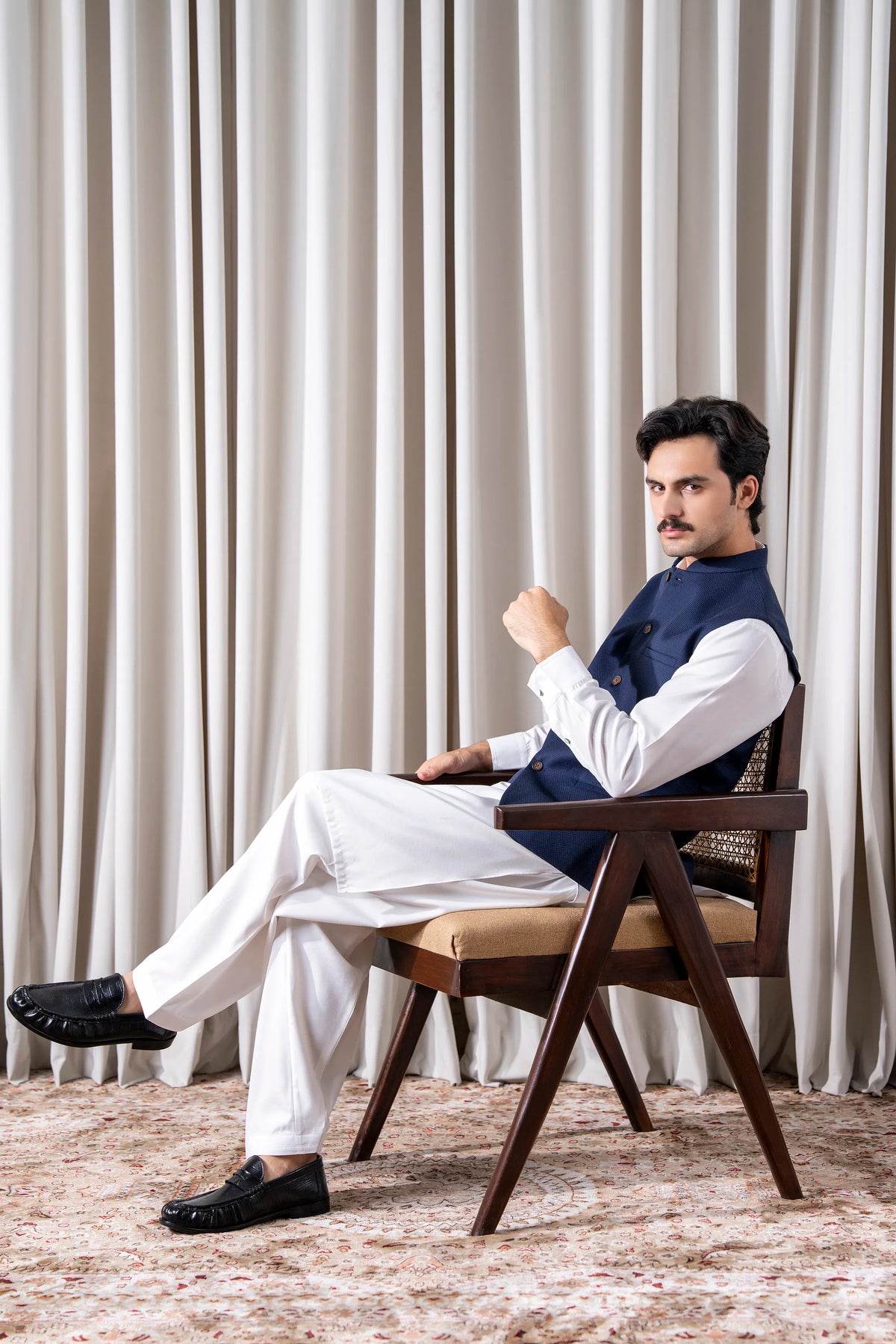 Navy cotton linen waistcoat front view with four-button closure and welt pockets