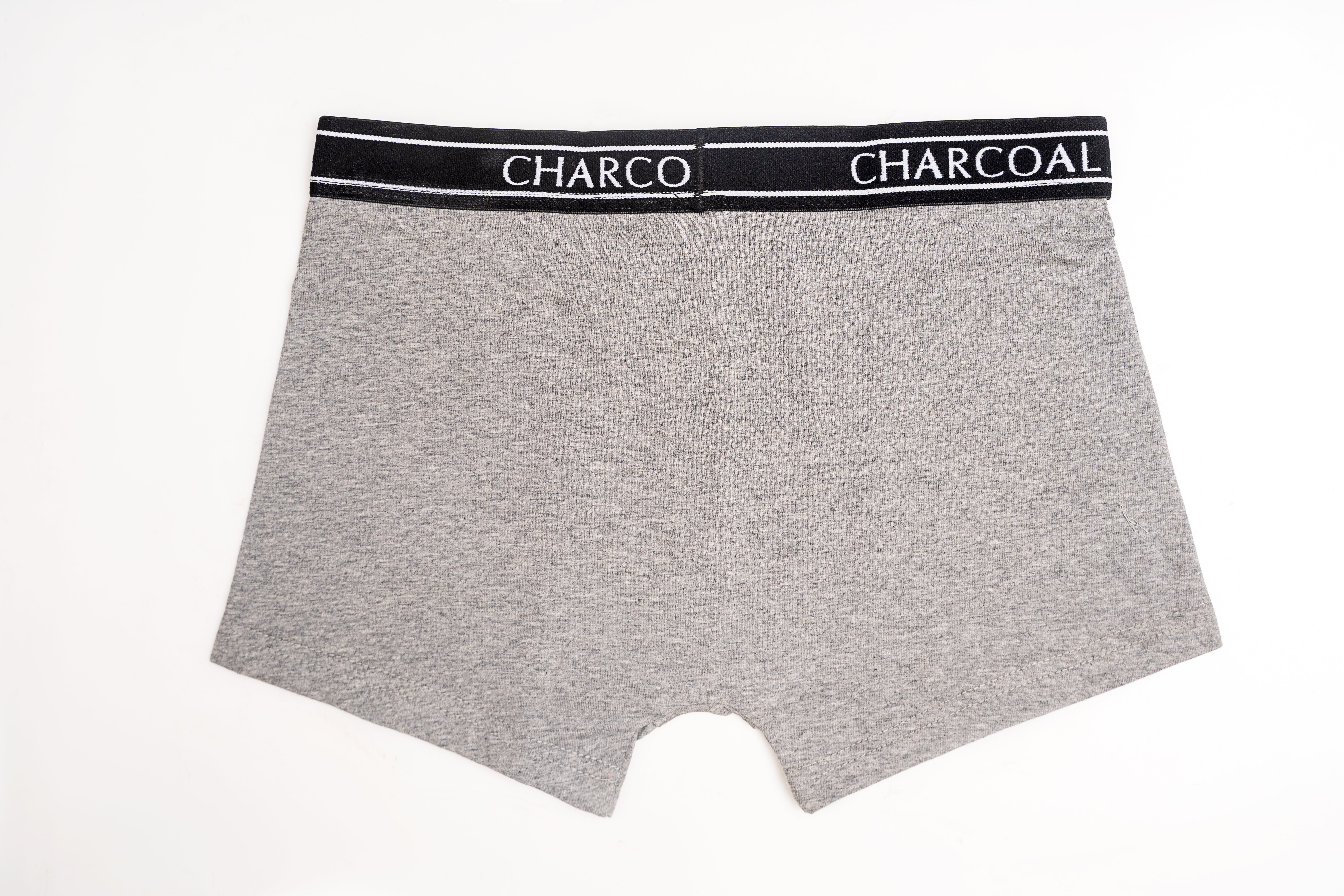 Heather grey boxer shorts with black waistband and white “CHARCOAL” print