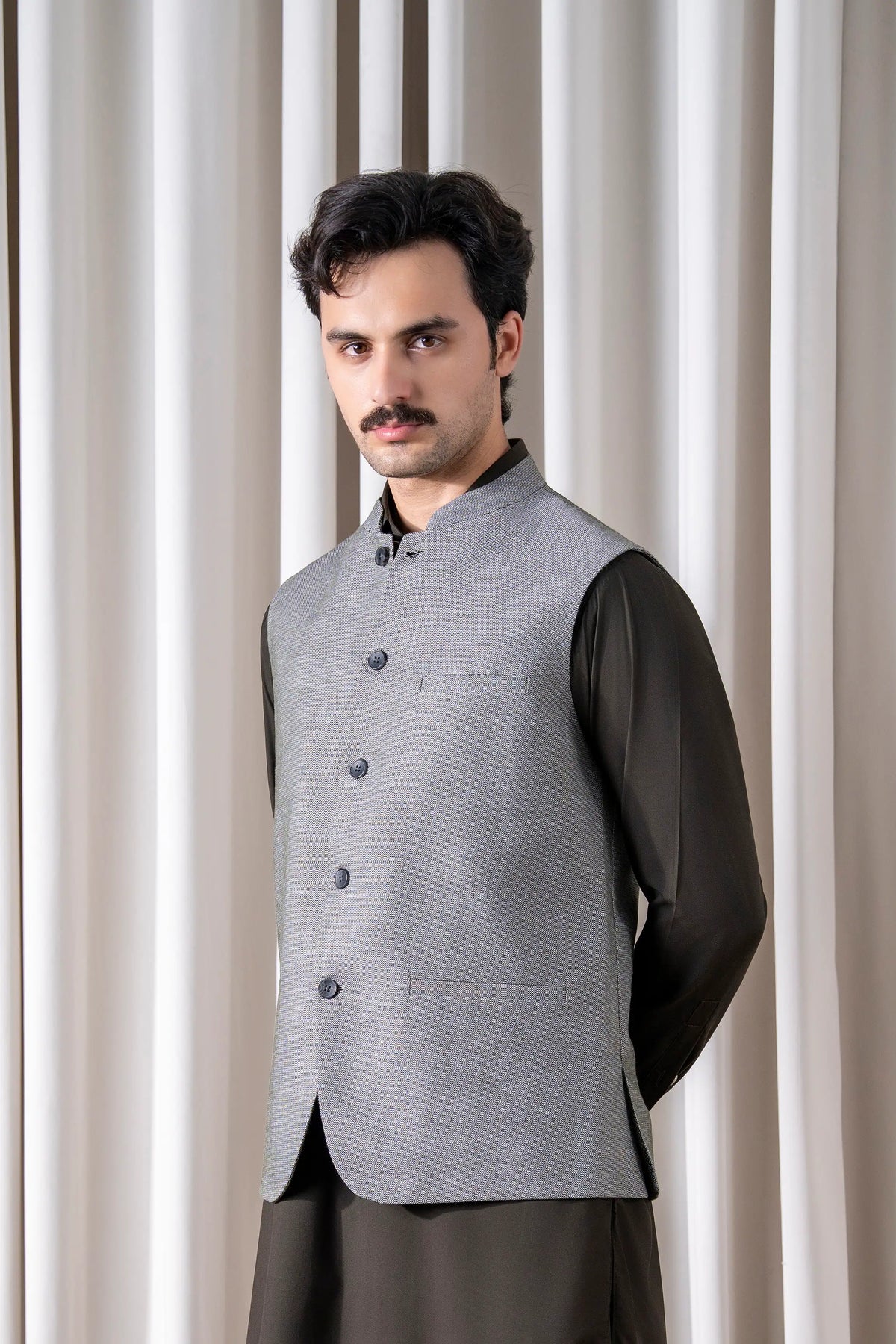 Light gray cotton-linen waistcoat with stand collar, dark side panel, black buttons