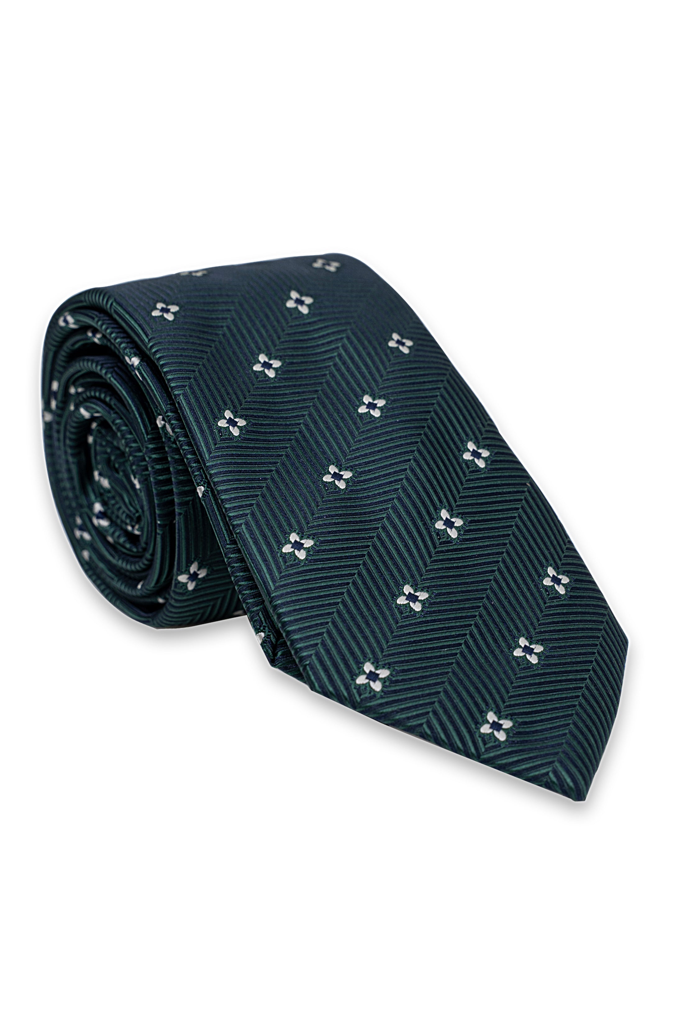 Dark teal patterned tie roll with small clover motifs, folded near knot