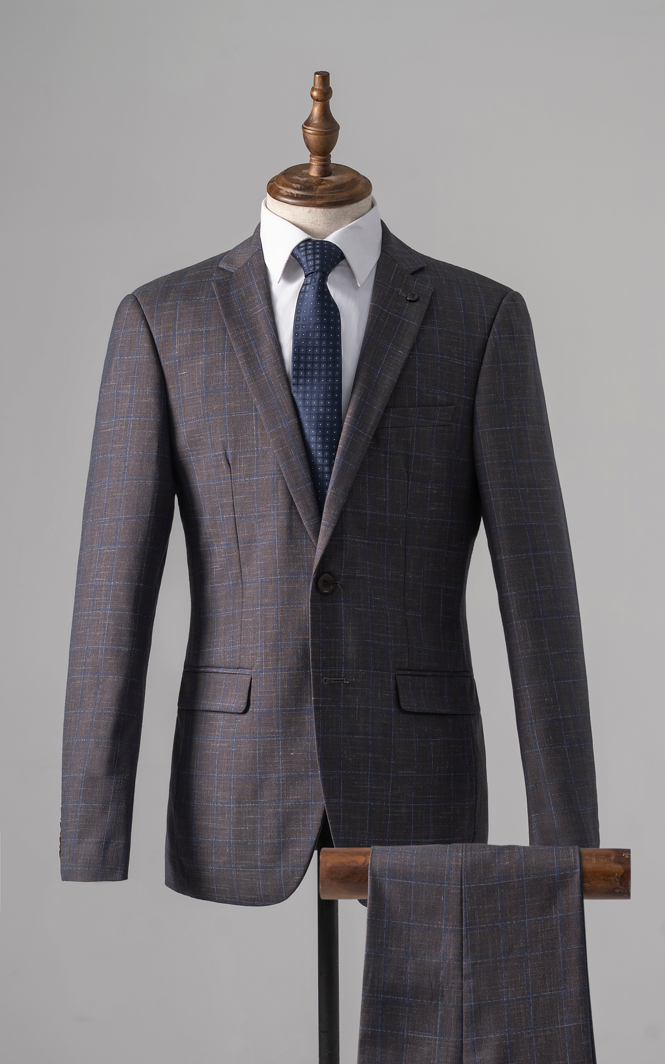 Slim-fit check suit with matching trousers on mannequin