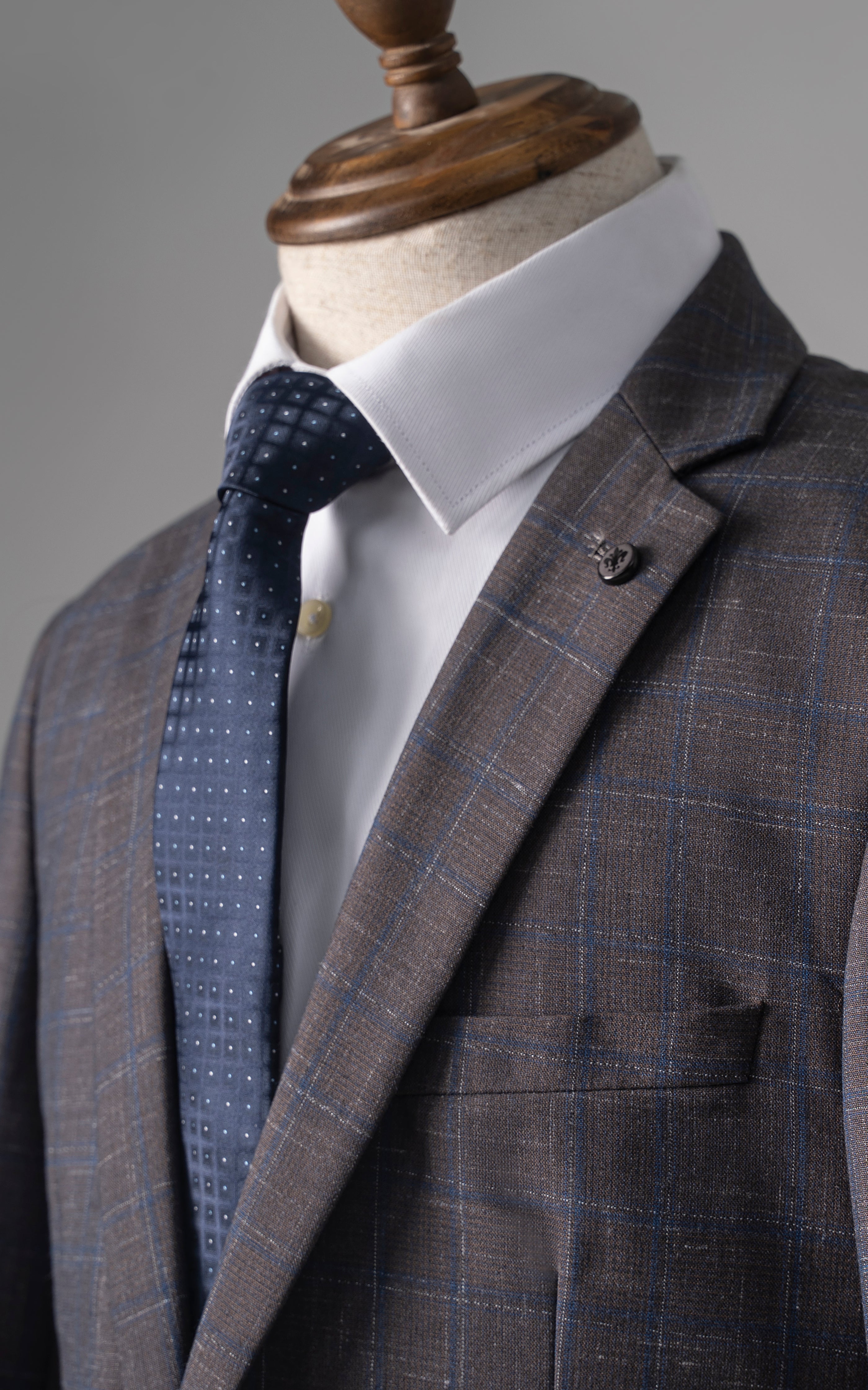 Slim-fit check suit jacket with white shirt and navy dotted tie