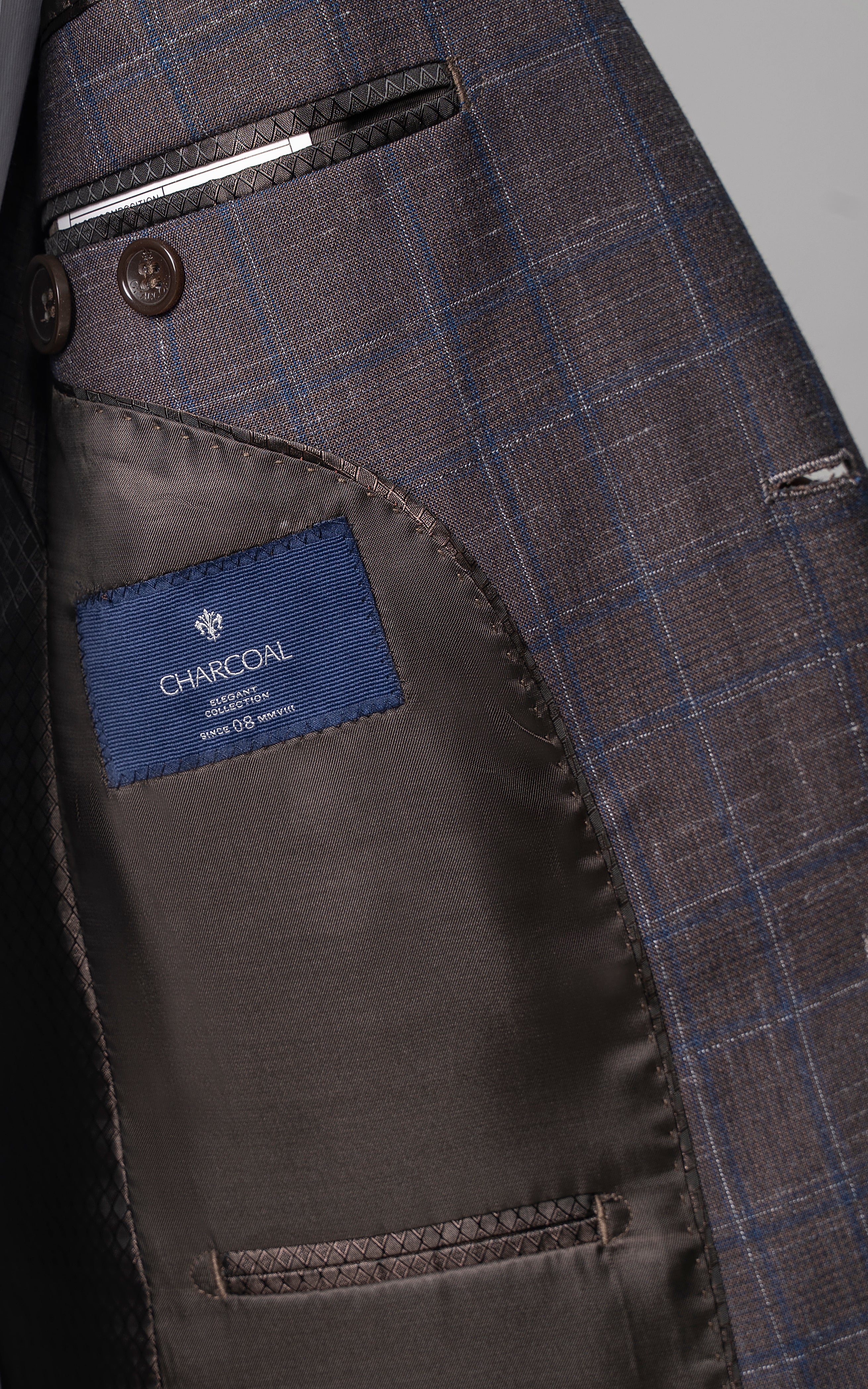Check suit jacket interior pocket lining label