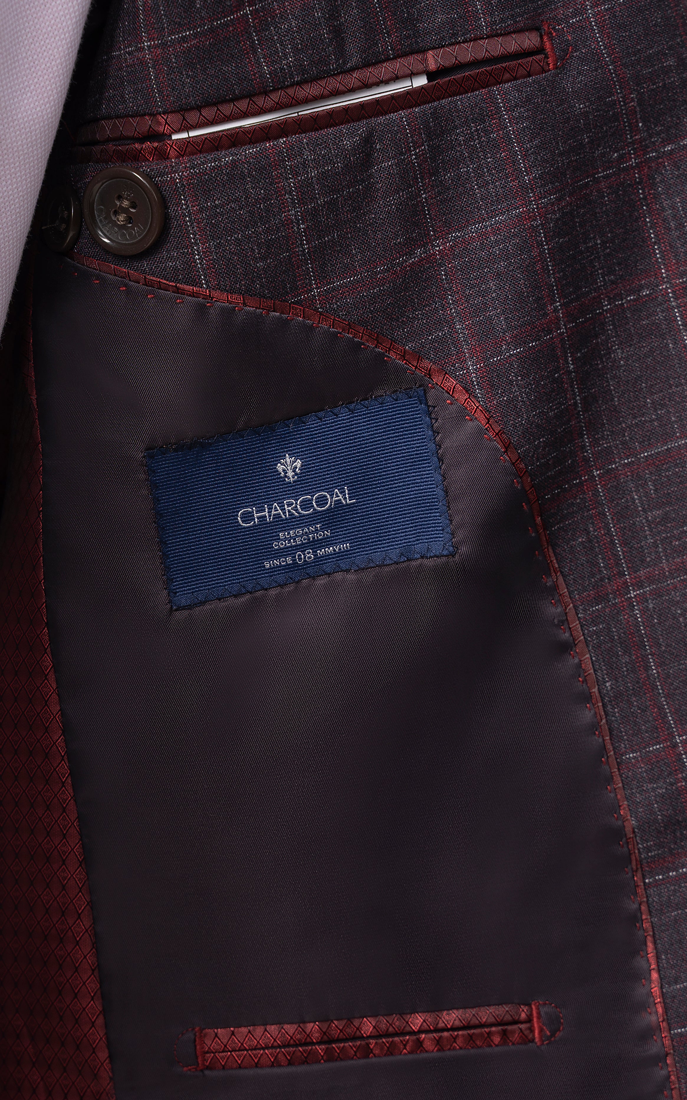 Maroon check waistcoat panel with dark lining, pocket, and red-stitched edge