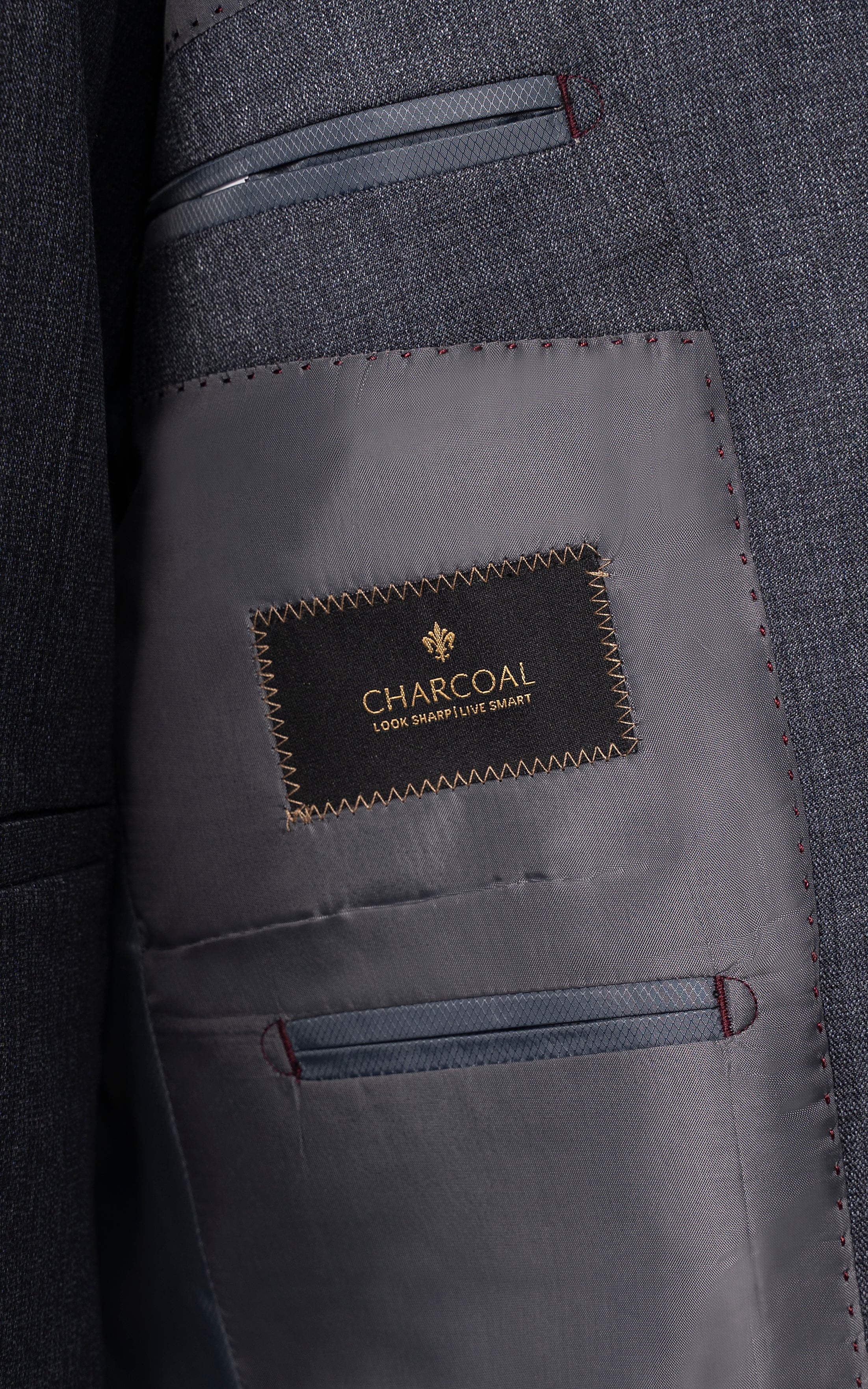 Suit jacket inner lining with CHARCOAL label and stitched pocket
