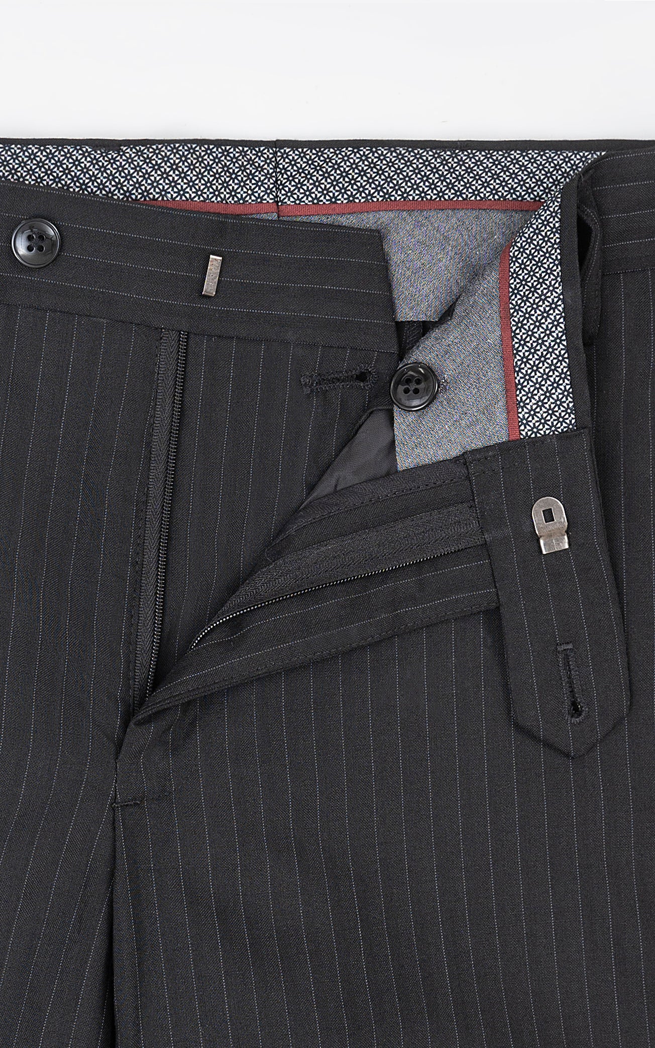 Slim-fit black pinstripe dress pants with inner waistband and fly zip