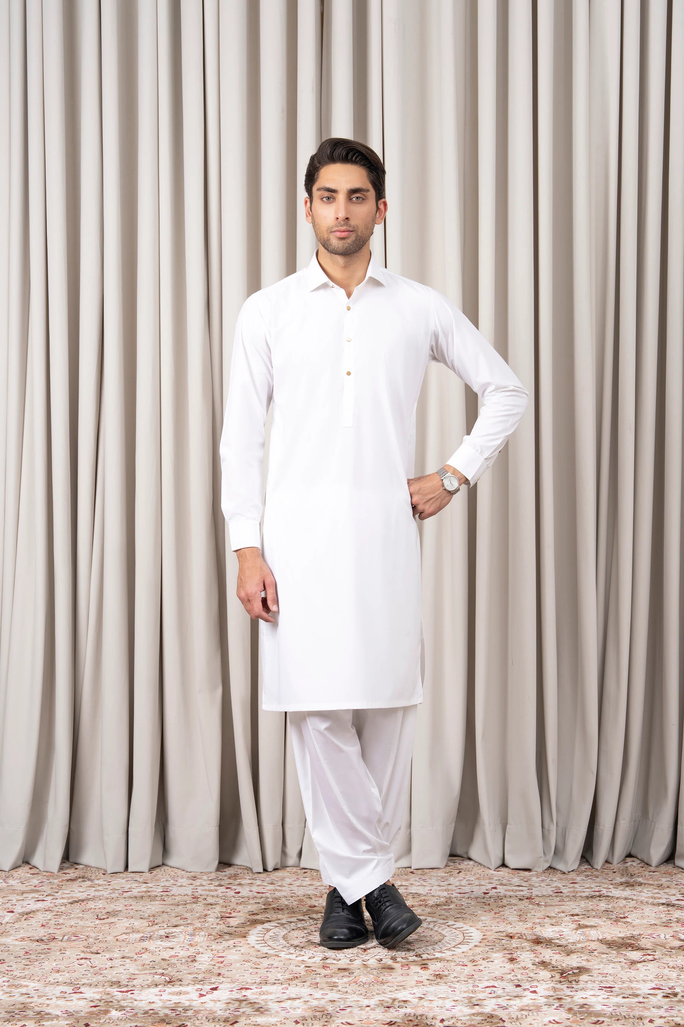 White blended kameez shalwar set in long tunic style with matching trousers